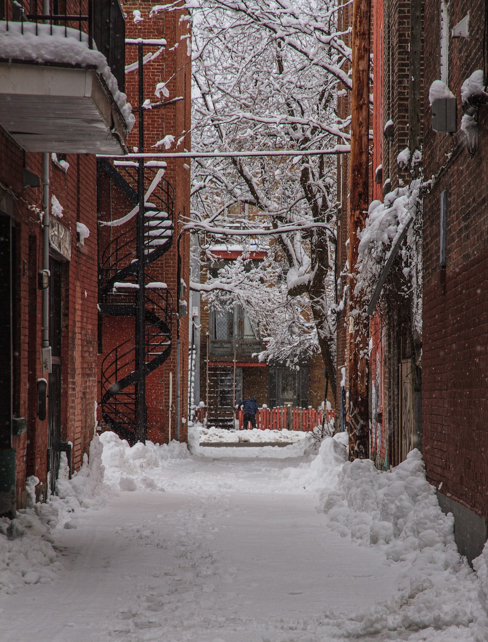 Brown brick building covered with snow photo