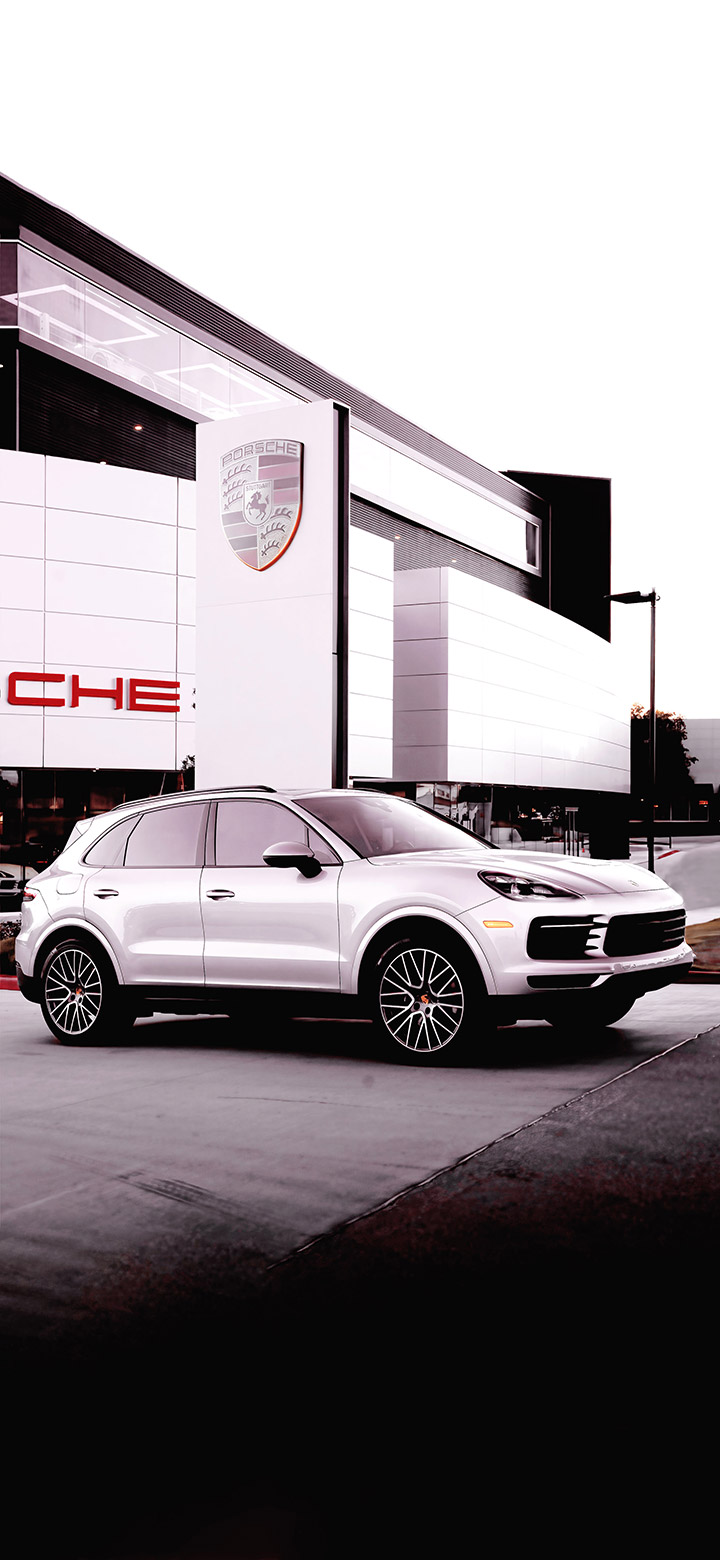 Porsche Macan In Front Of Showroom 4K