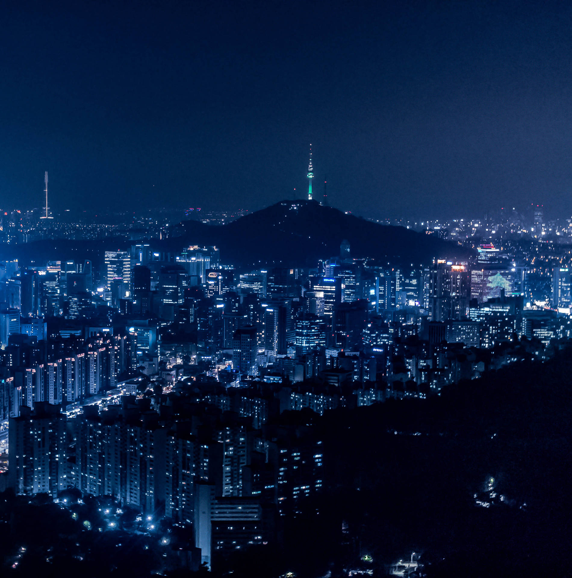 Download Seoul Lit Up in the Night Sky Wallpaper