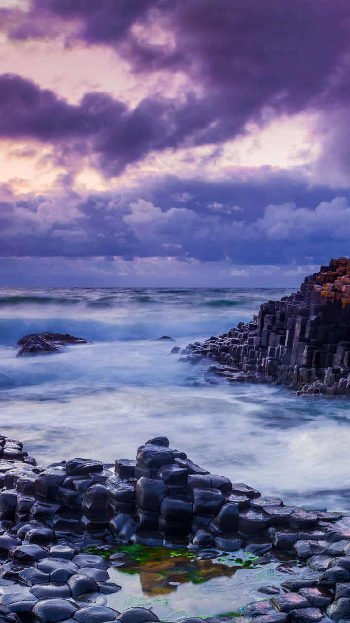 Download Caption: Majestic High Tide at Giant's Causeway, Northern Ireland Wallpaper