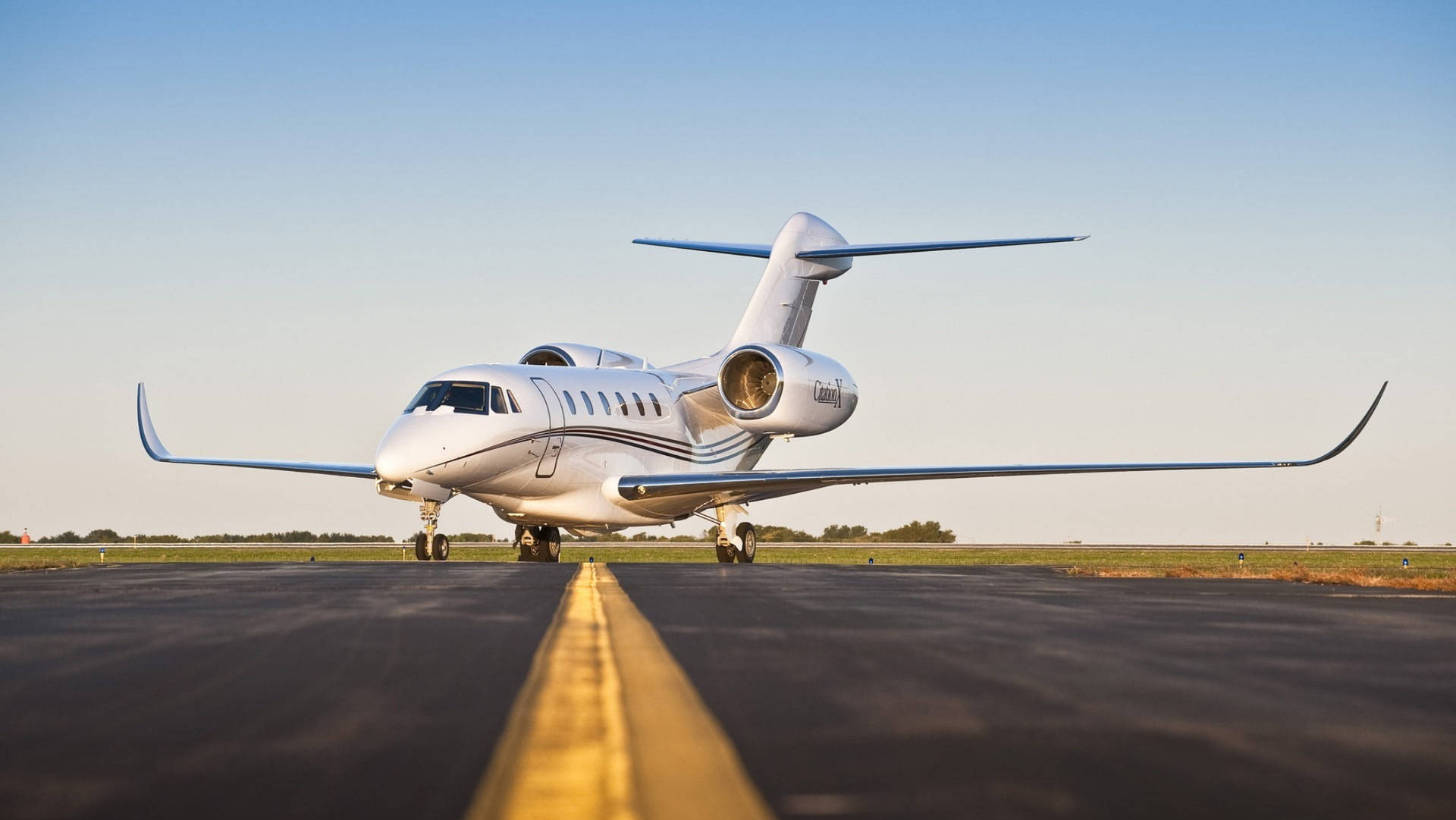 Download Luxurious Cessna Plane On The Runway Wallpaper