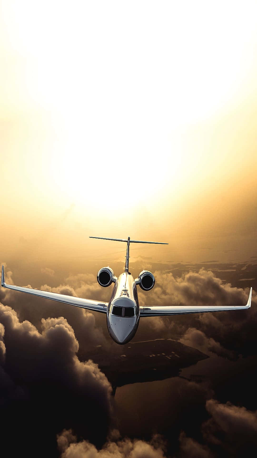 Download Jet Soaring Against a Vibrant Sky
