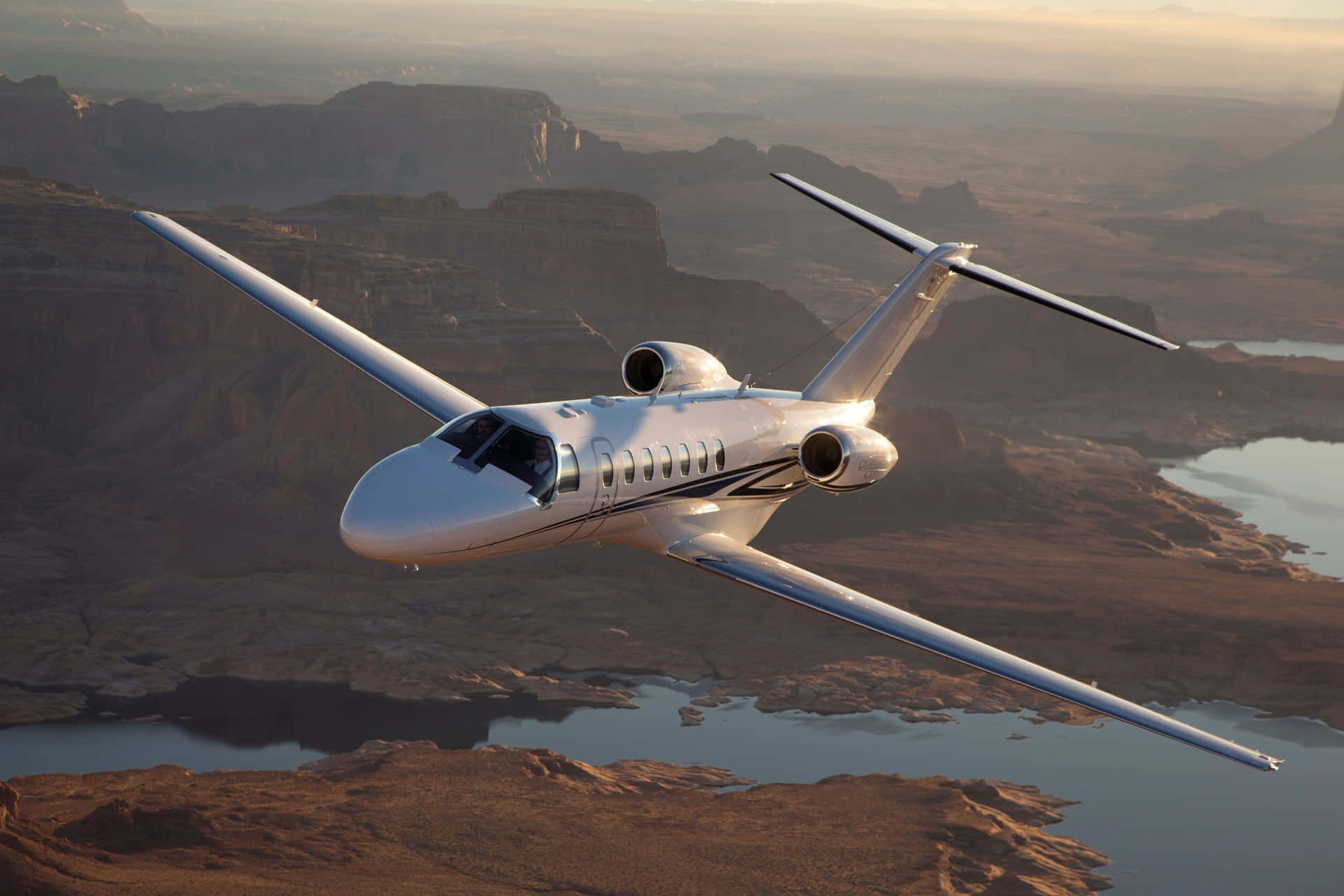 Download Private Jet Flies Over Wallpaper