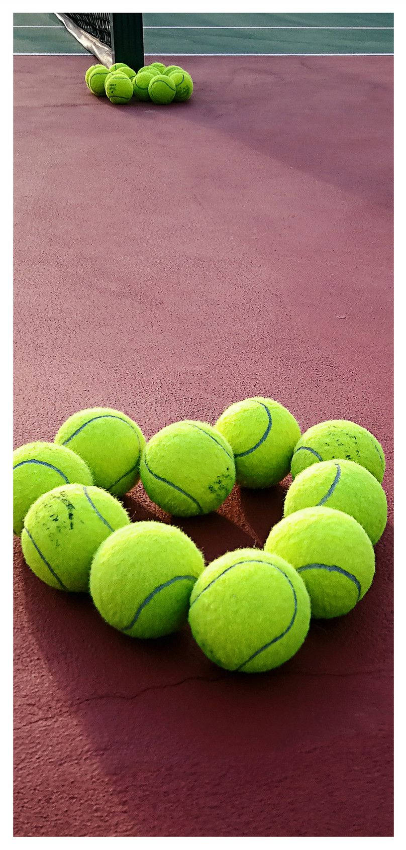 Download Elegant Tennis Ball on Smartphone Screen Wallpaper