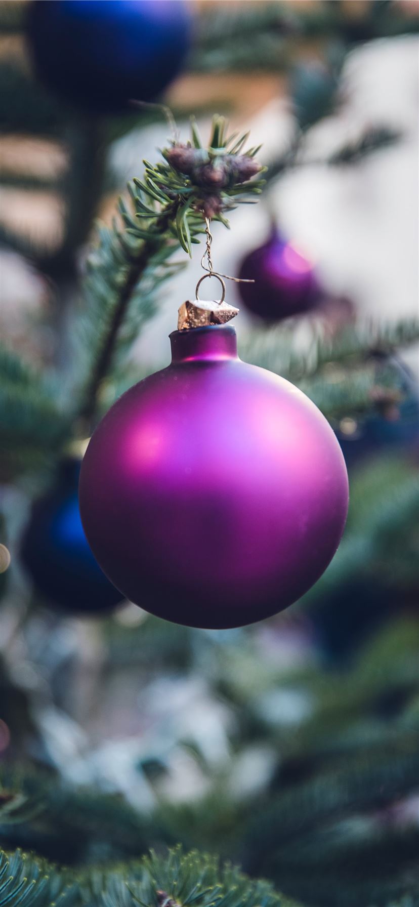 purple Christmas ball hang on Christmas tree iPhone X Wallpaper Free Download