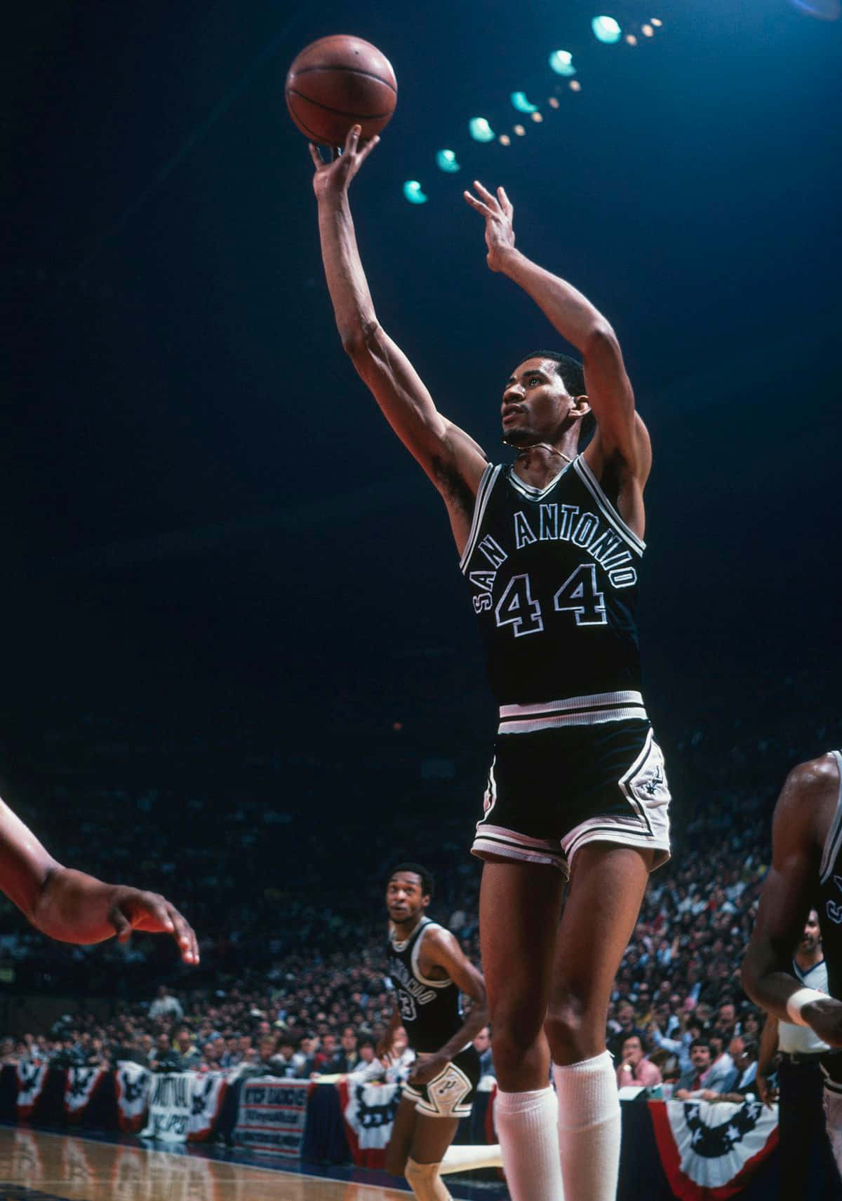 Download Cool George Gervin Basketball Shooting Wallpaper