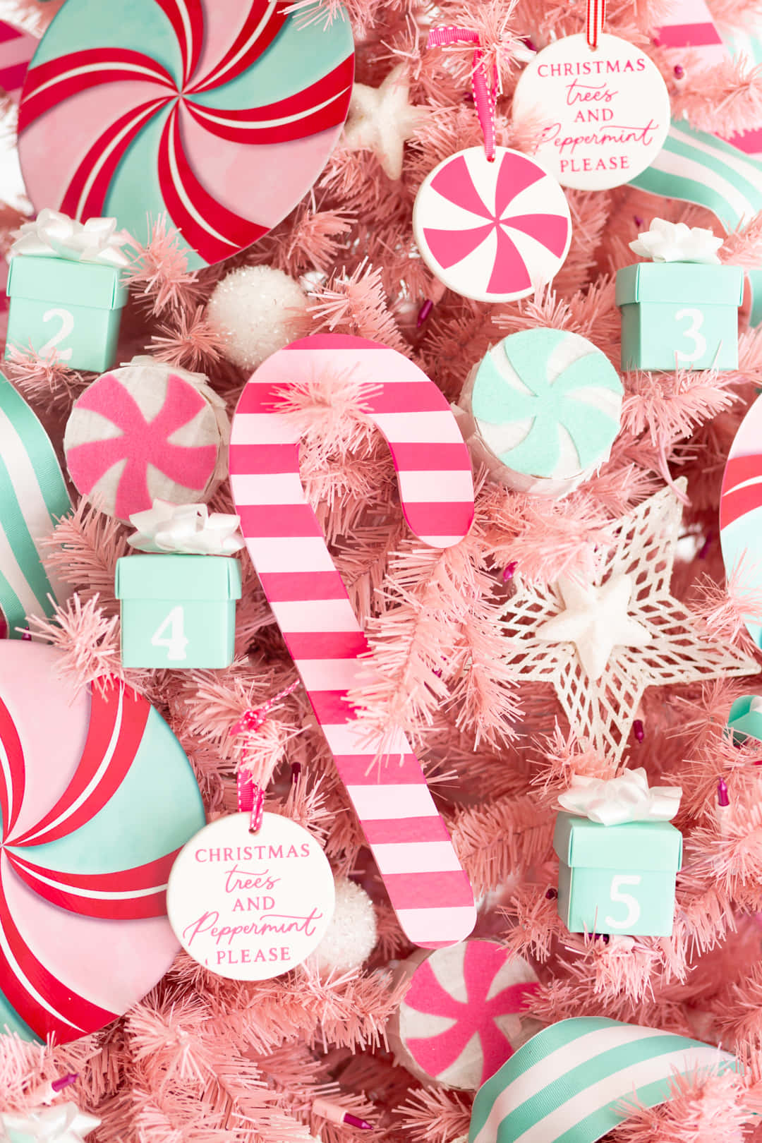 Download Celebrate the holidays in a festive and fun way with this charming Pink Christmas Tree. Wallpaper