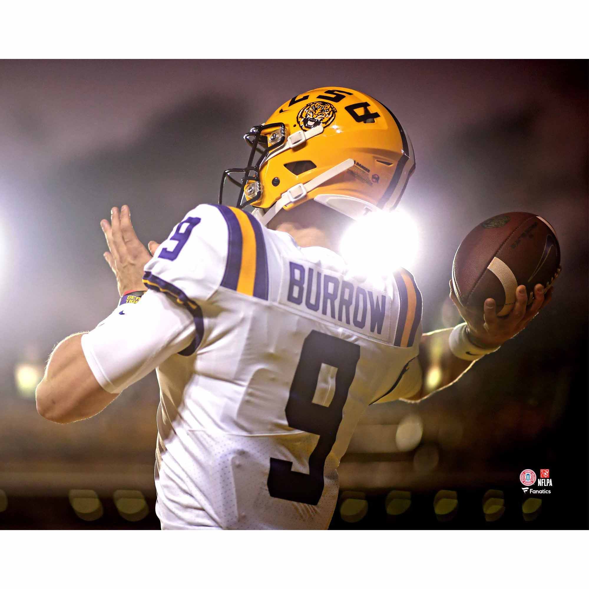 Joe Burrow LSU Tigers Unsigned White Jersey Throwing Under Spotlights Photograph