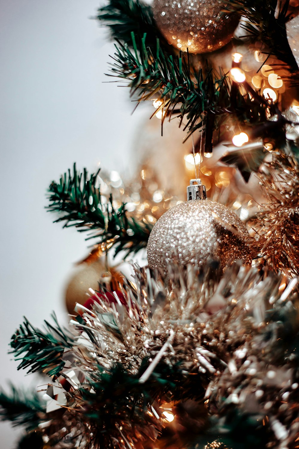 A close up of a christmas tree with ornaments photo