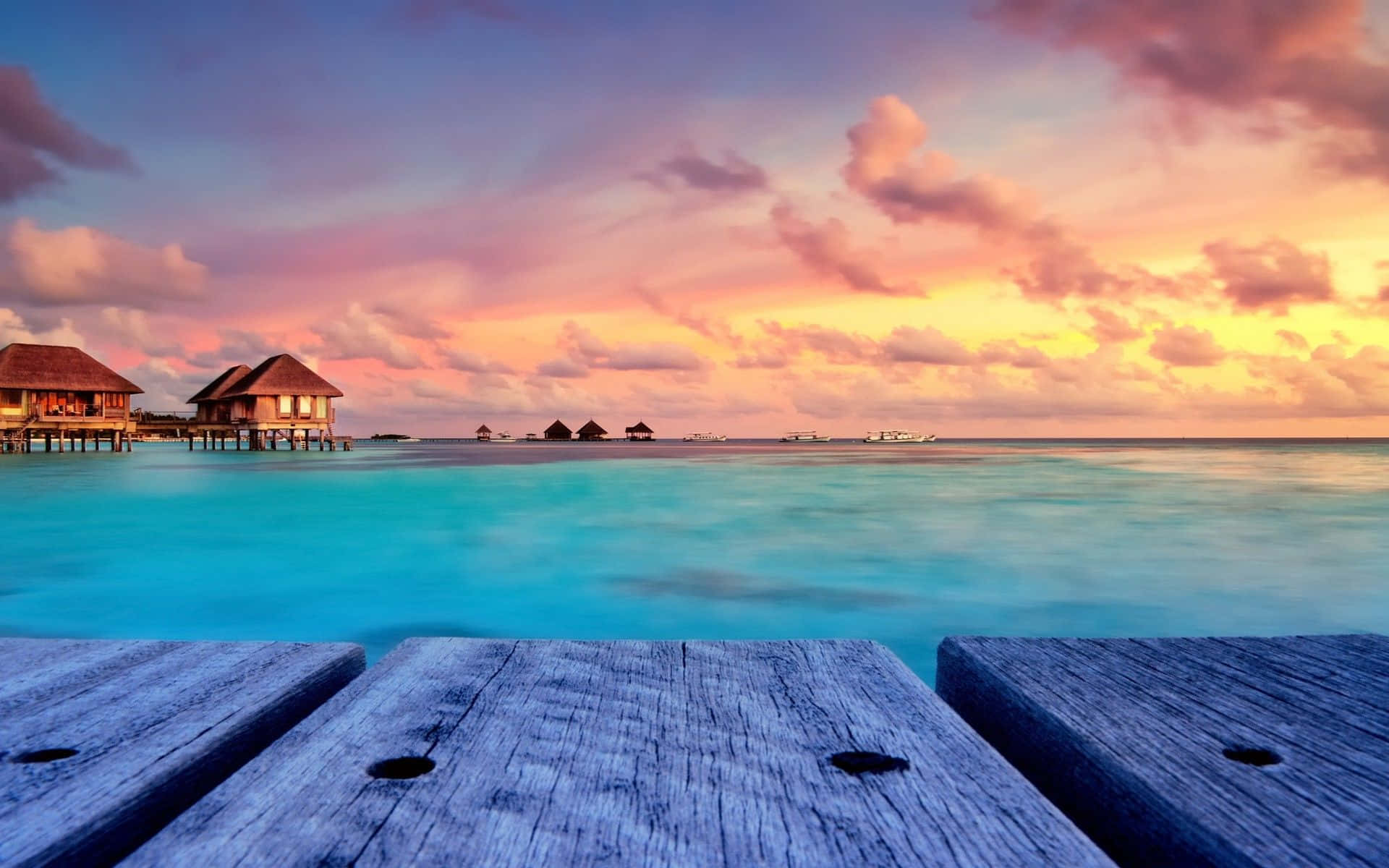 Download Serene Maldives Beach at Sunset Wallpaper