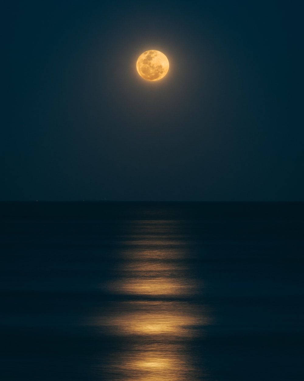 Download Beautiful Moon Above The Calm Sea Wallpaper