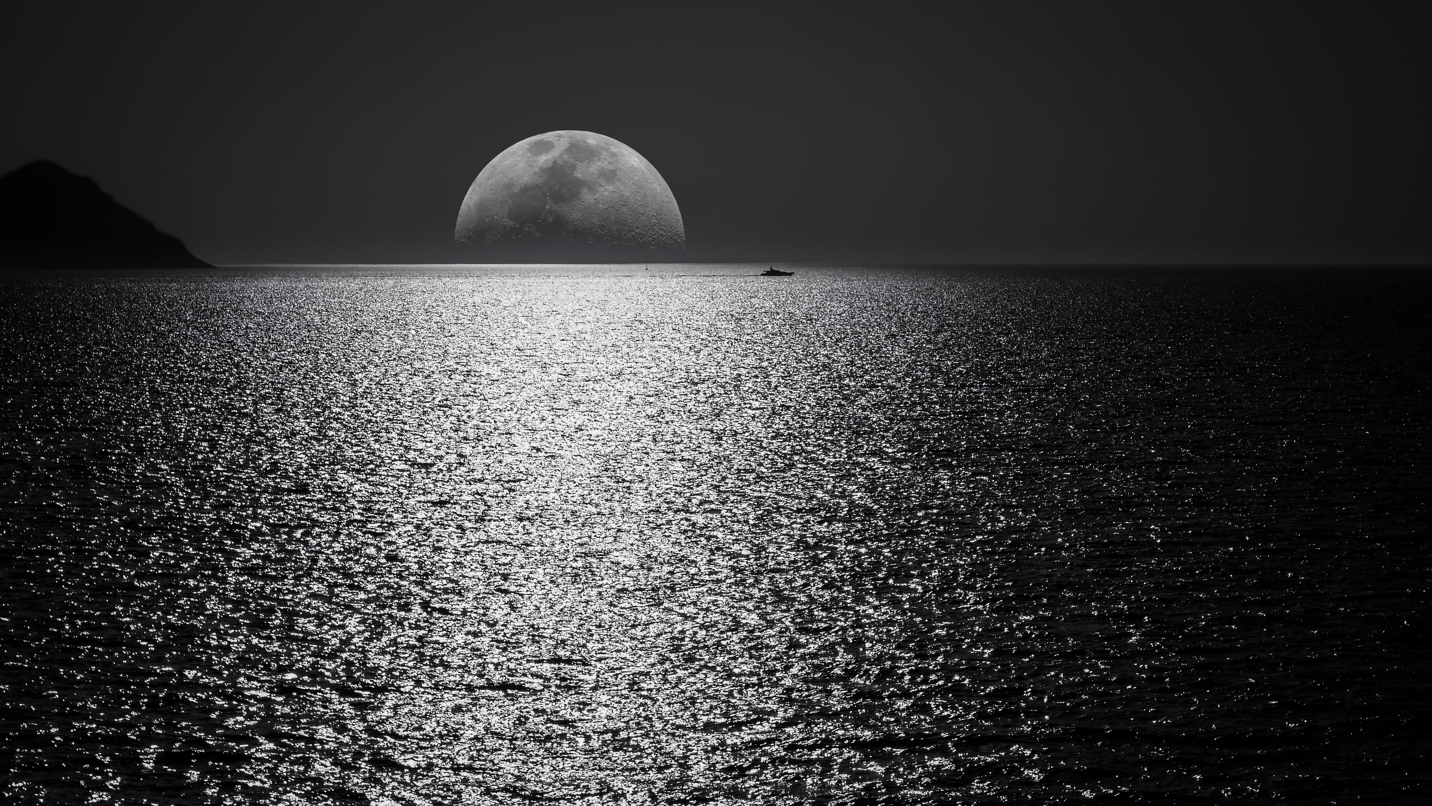 White and Black Moon With Black Skies and Body of Water Photography during Night Time · Free