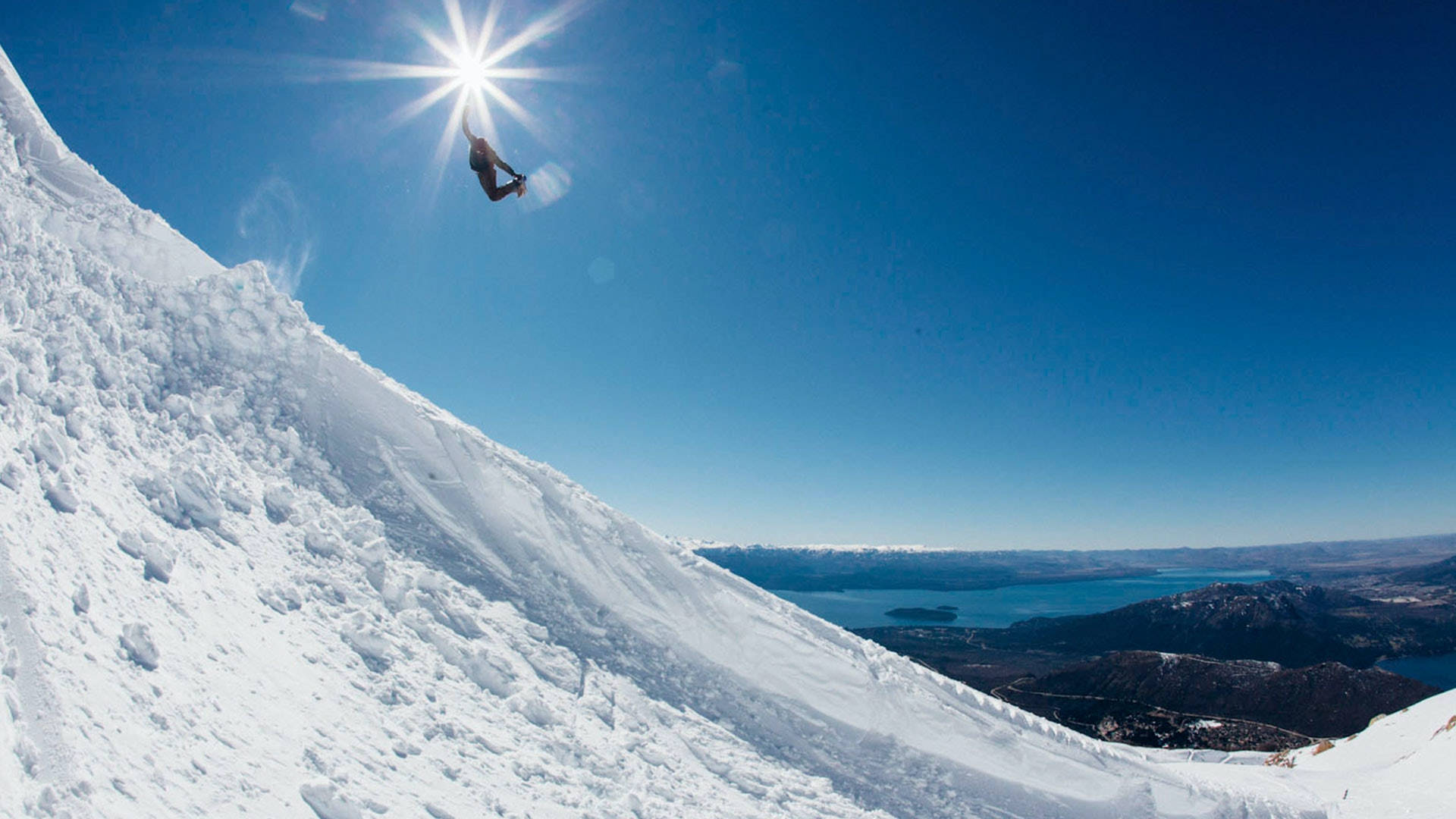 Download Snowboarding Under The Sun Wallpaper