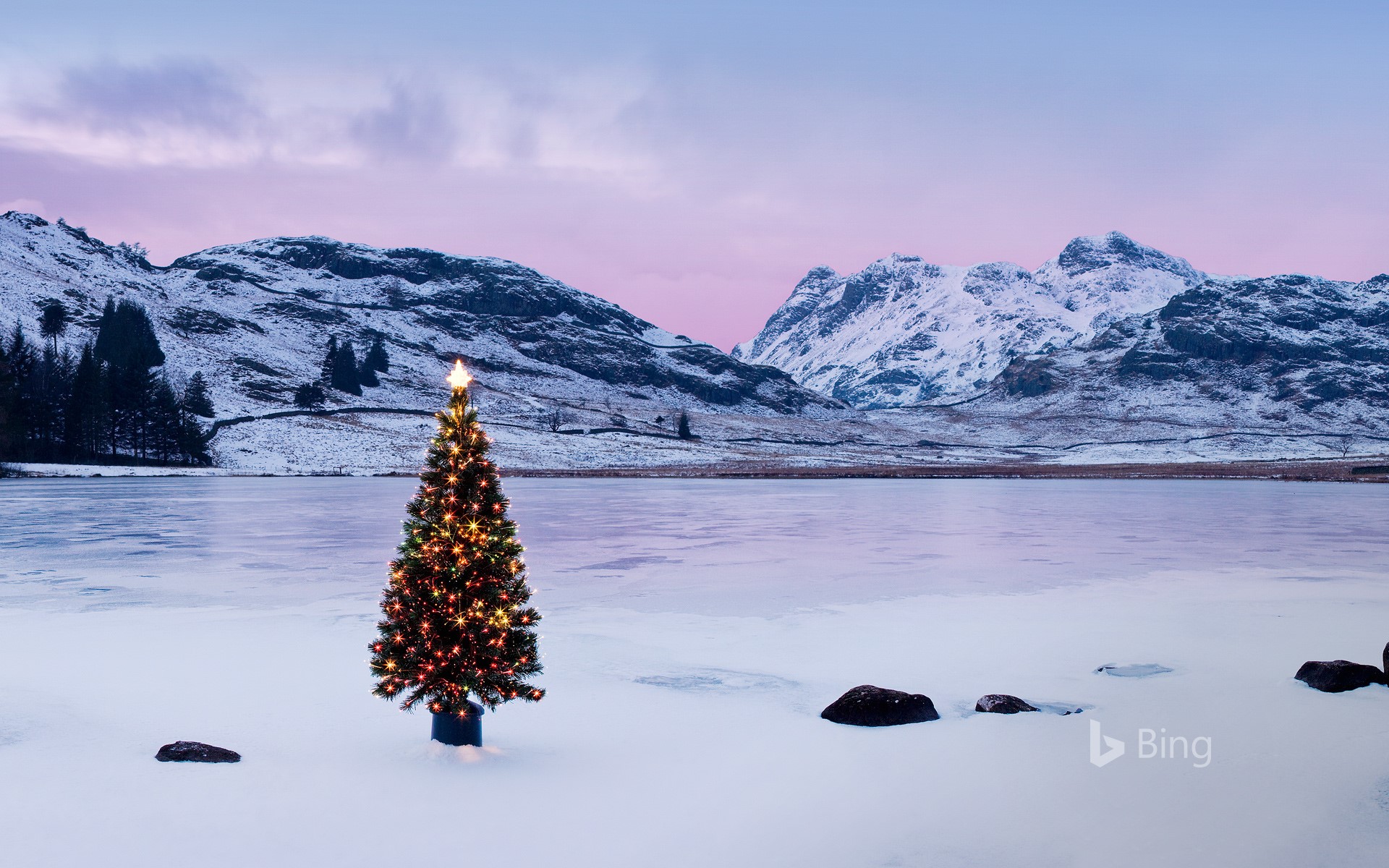 The Langdale Pikes with an illuminated Christmas tree, Lake District National Park Wallpaper
