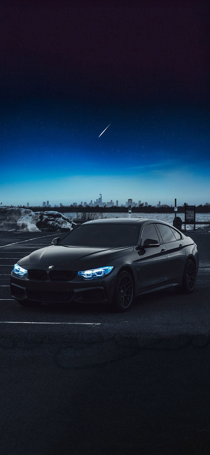 Black BMW Under Moonlight 4K Phone