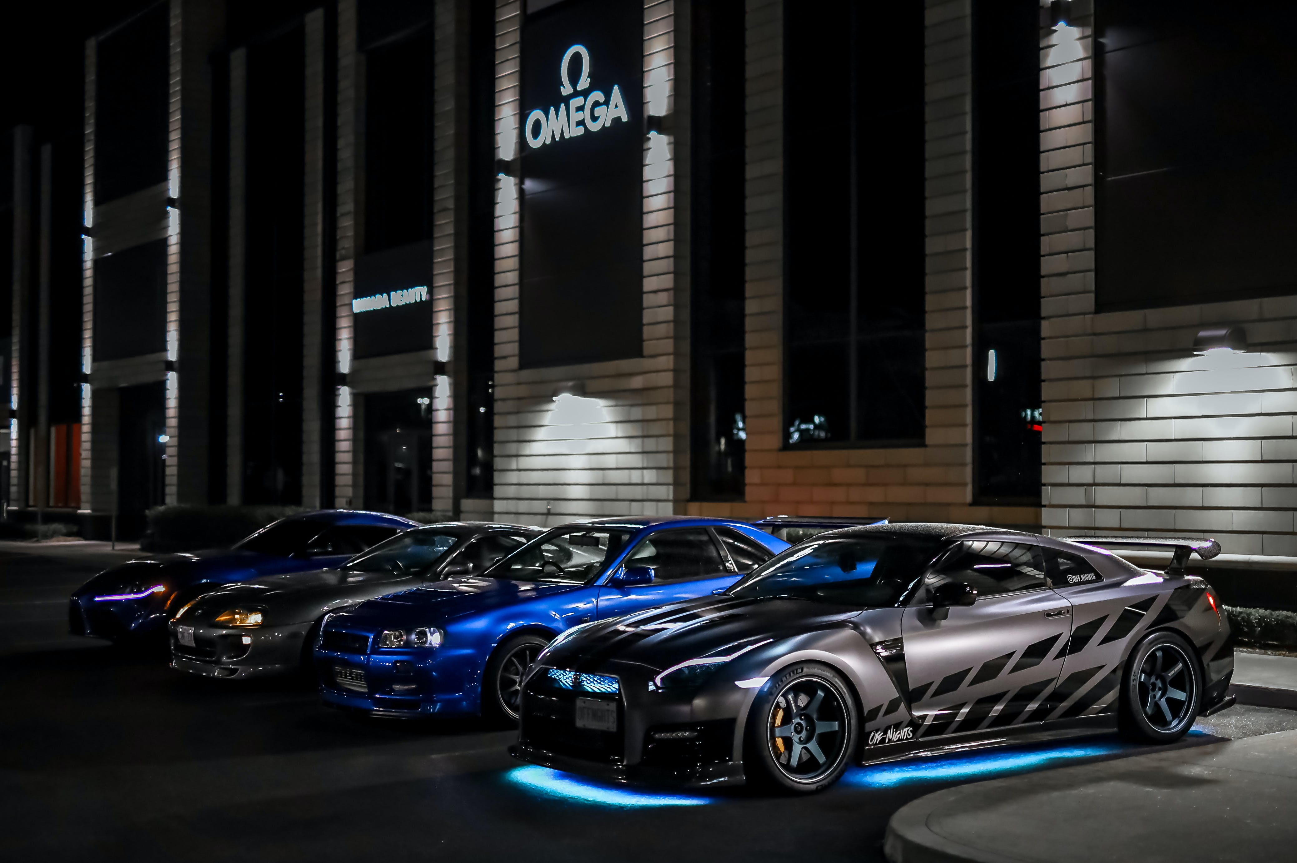 Japanese Sports Cars on the Parking Lot at Night · Free