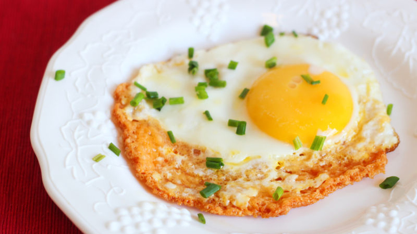 Behold the Cheesy, Crispy Glory of the Frico Fried Egg
