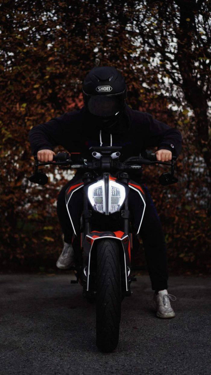 Download Rider Wearing All Black KTM IPhone Wallpaper