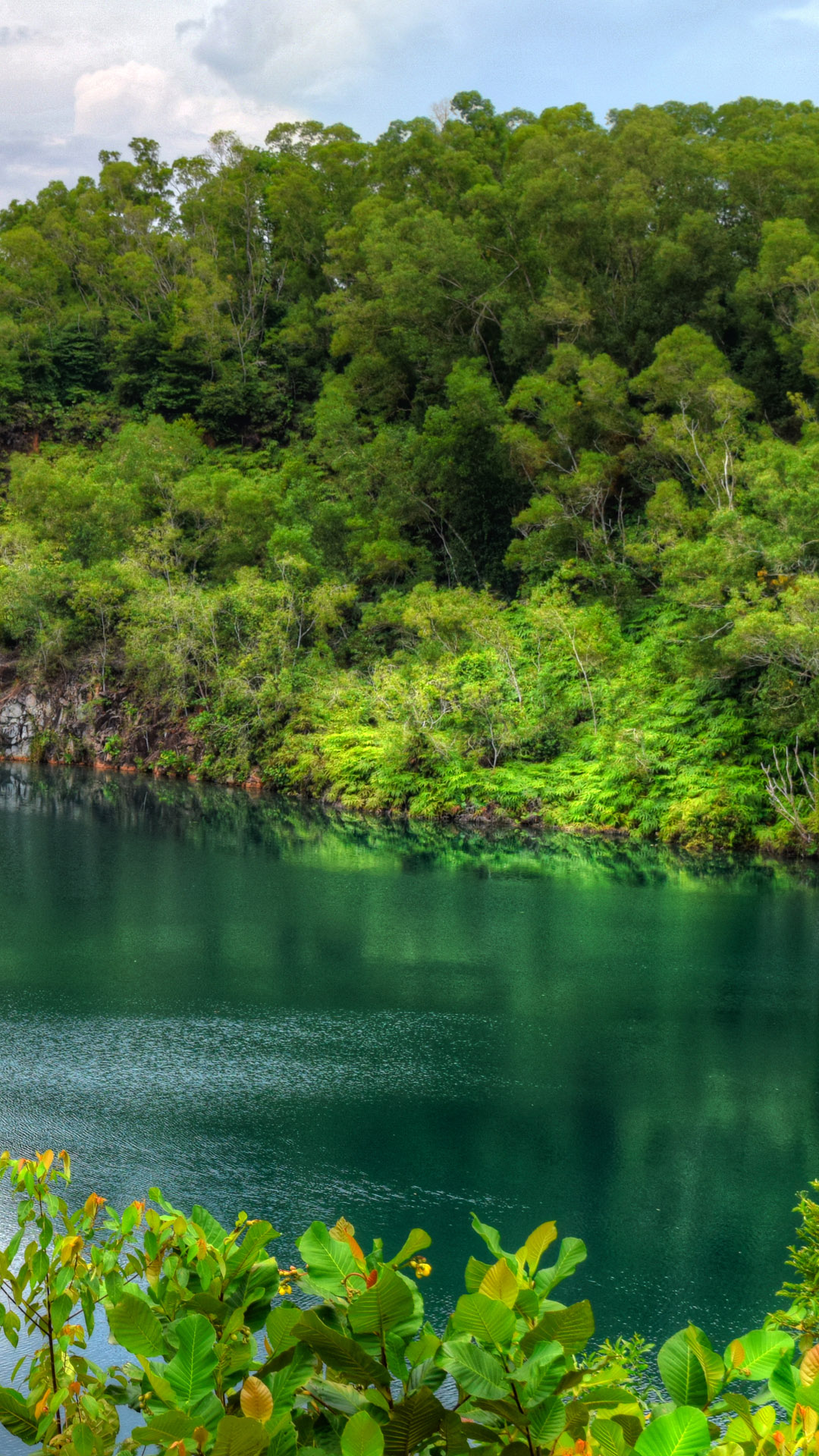 Green blue water lagoon in Pulau Ubin, Singapore. Windows Spotlight Image
