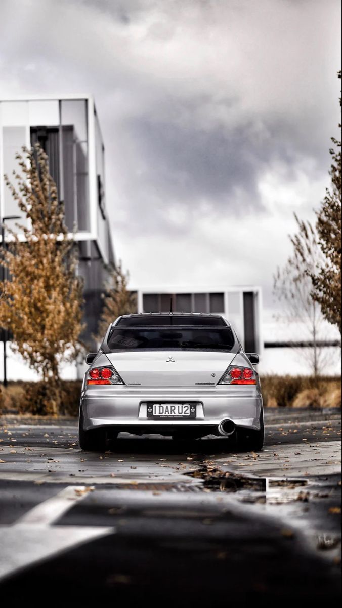 Mitsubishi Lancer Evo Wallpaper. Sky car, Silver car, Car parking