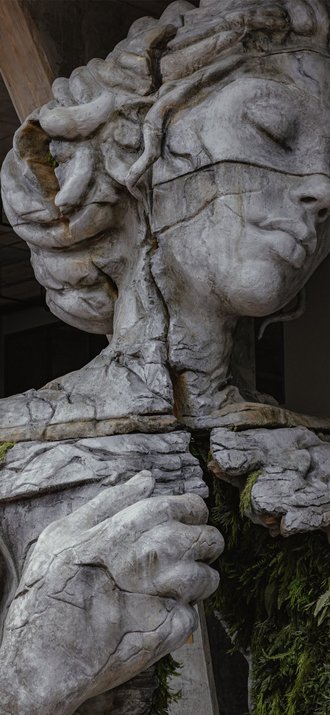 gray concrete statue of man holding stick iPhone Wallpaper Free Download