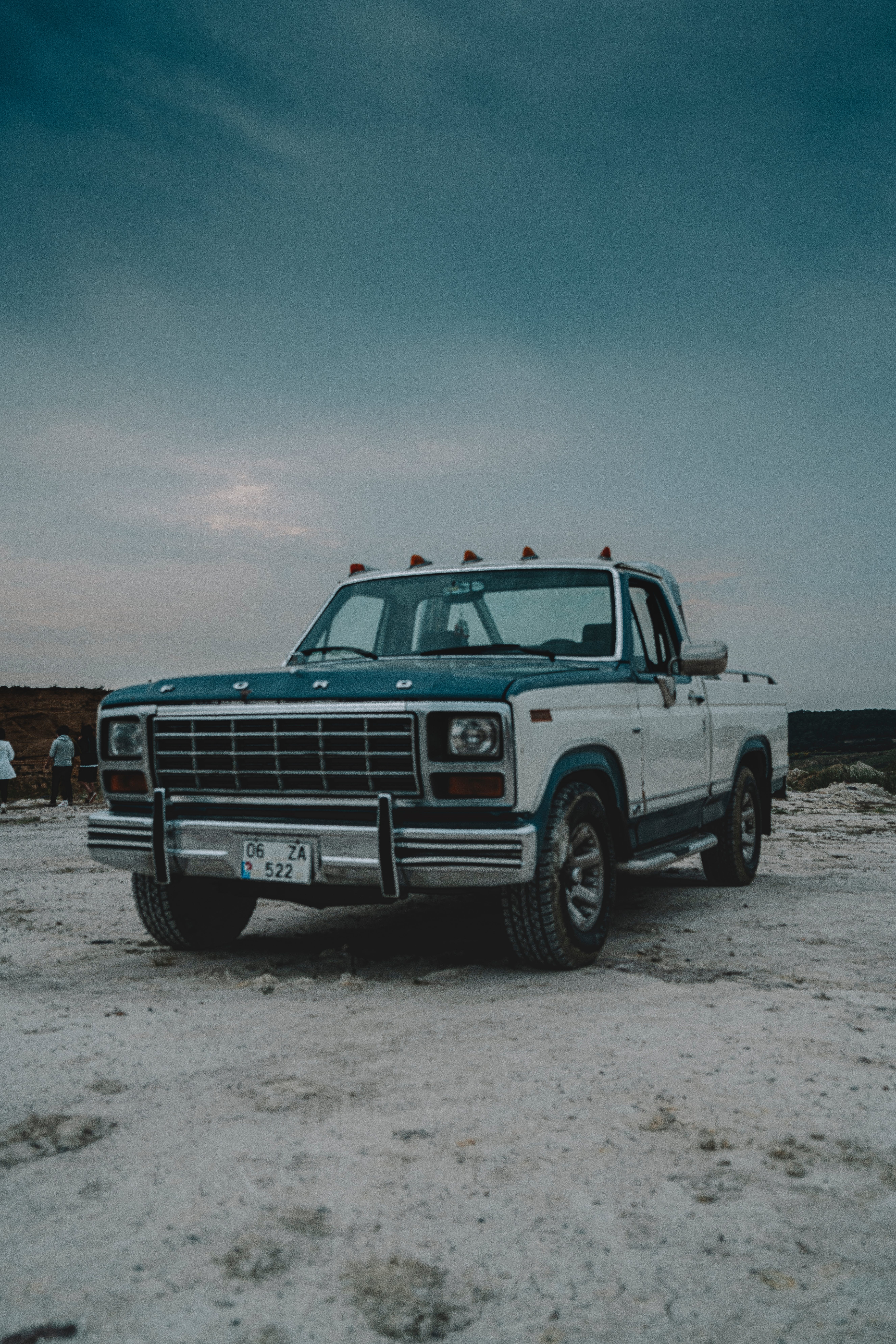 Blue and White Ford Pickup Truck on a