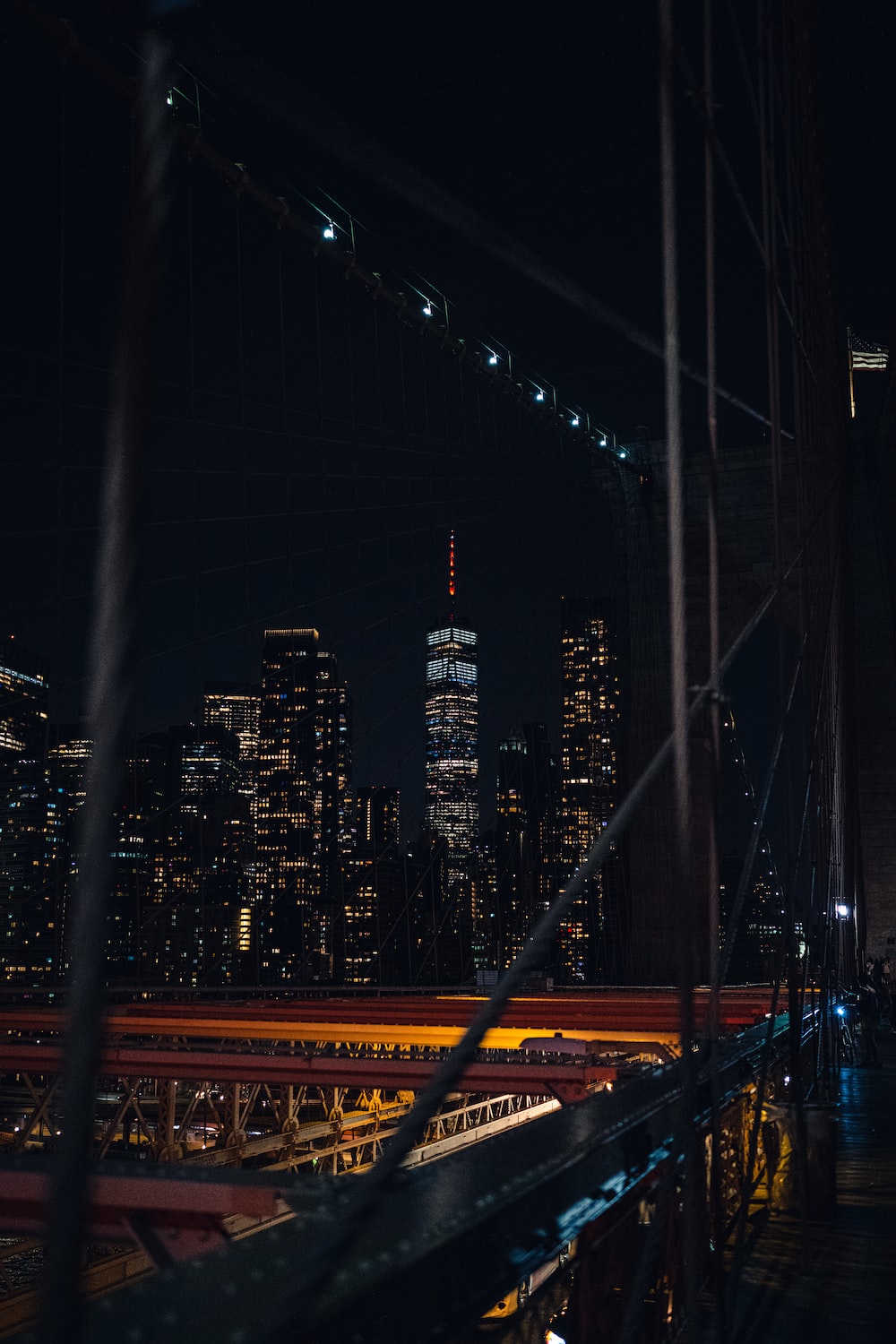 A bridge with a city in the background photo