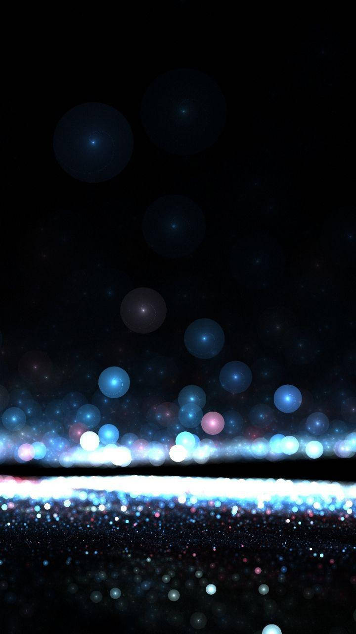 Download Dark Phone With Glowing Blue Orbs Wallpaper