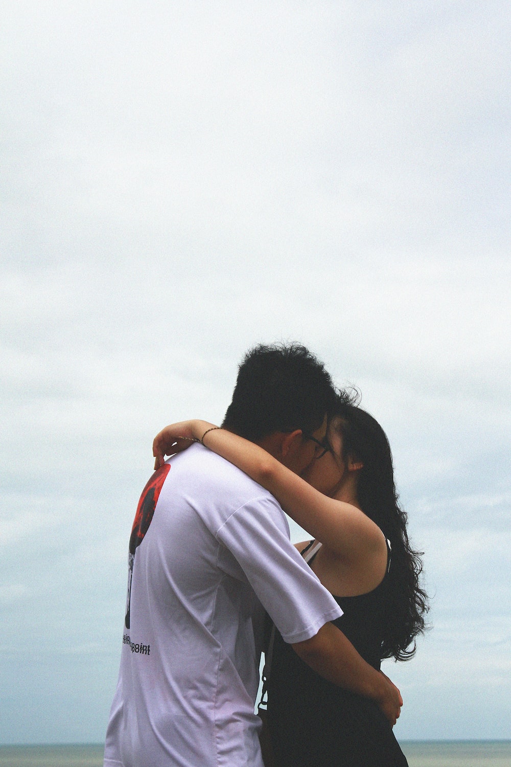 Kissing man and woman photo