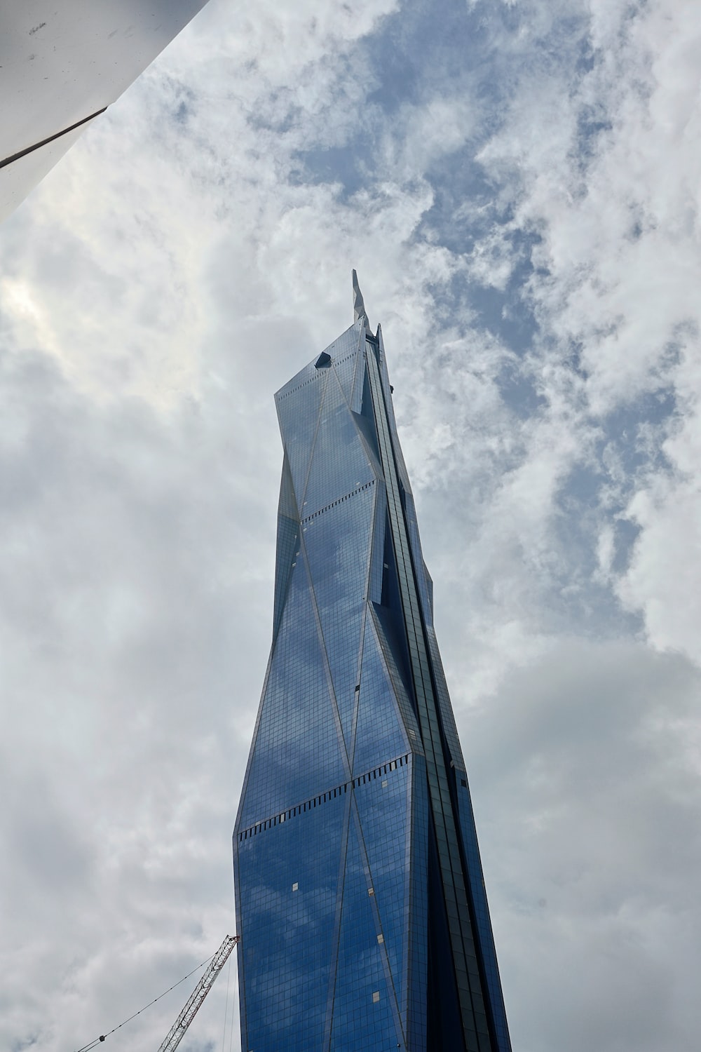 A very tall building with a sky background photo