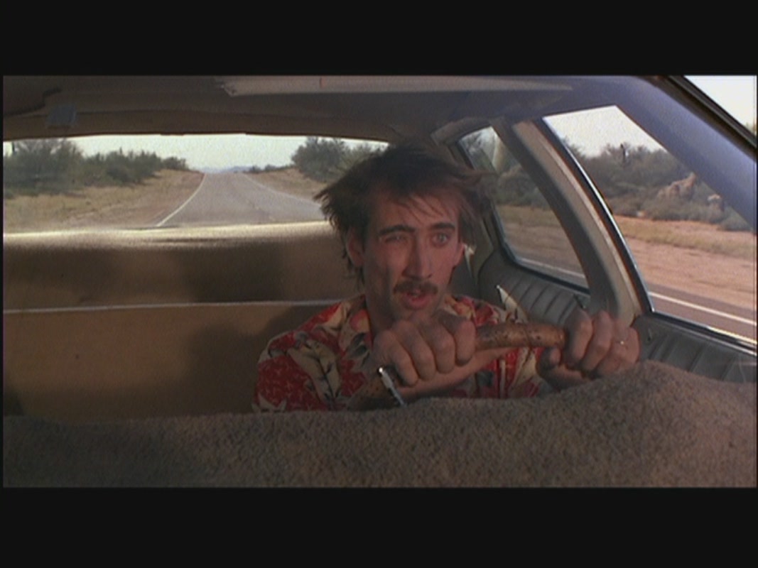 Nicolas Cage in Raising Arizona Cage Image
