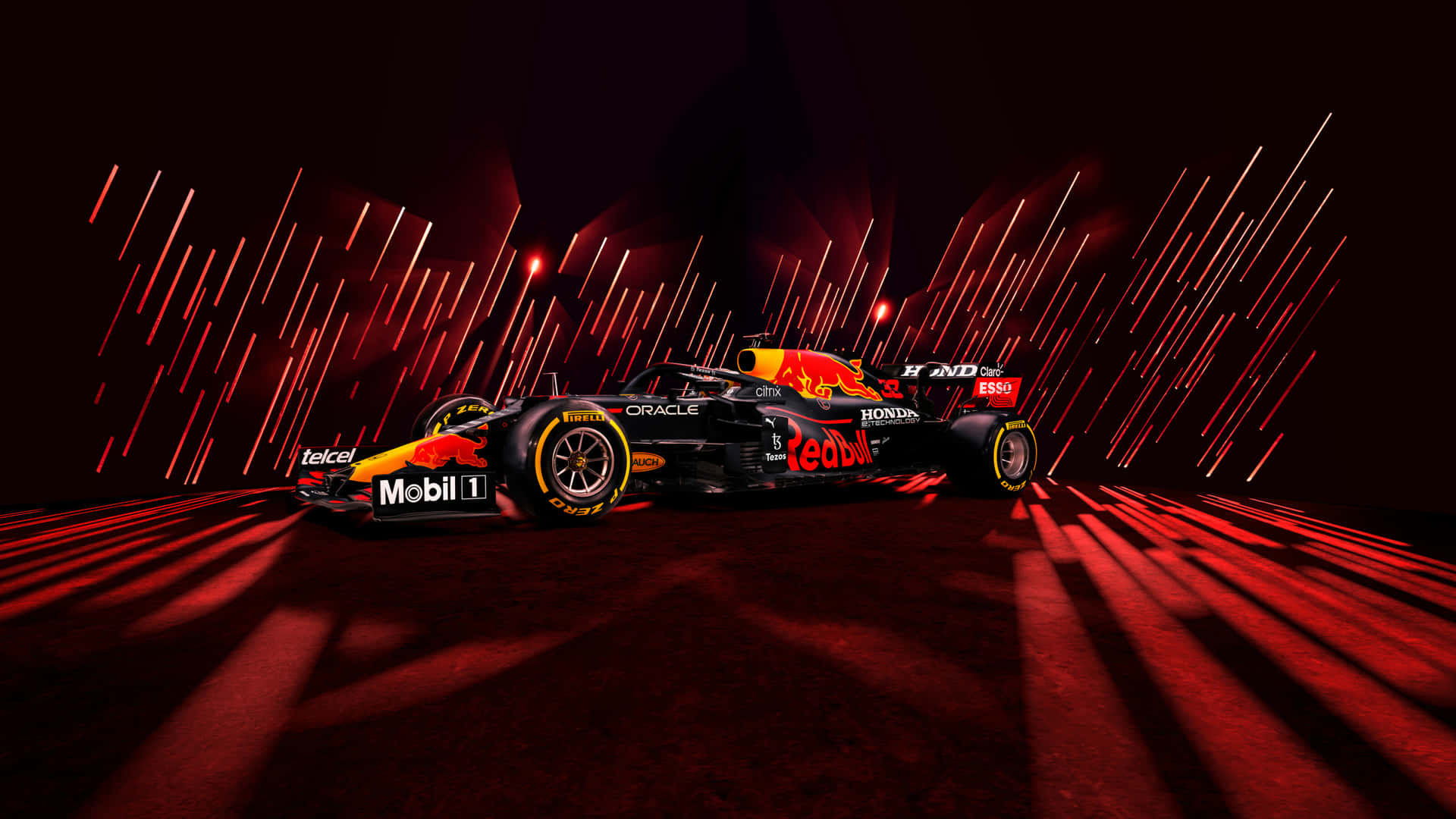 Download Red Bull Racing Car In A Dark Room Wallpaper