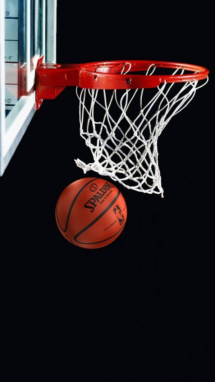 Download “A Perfectly Executed Red Ring Basketball Shot!” Wallpaper