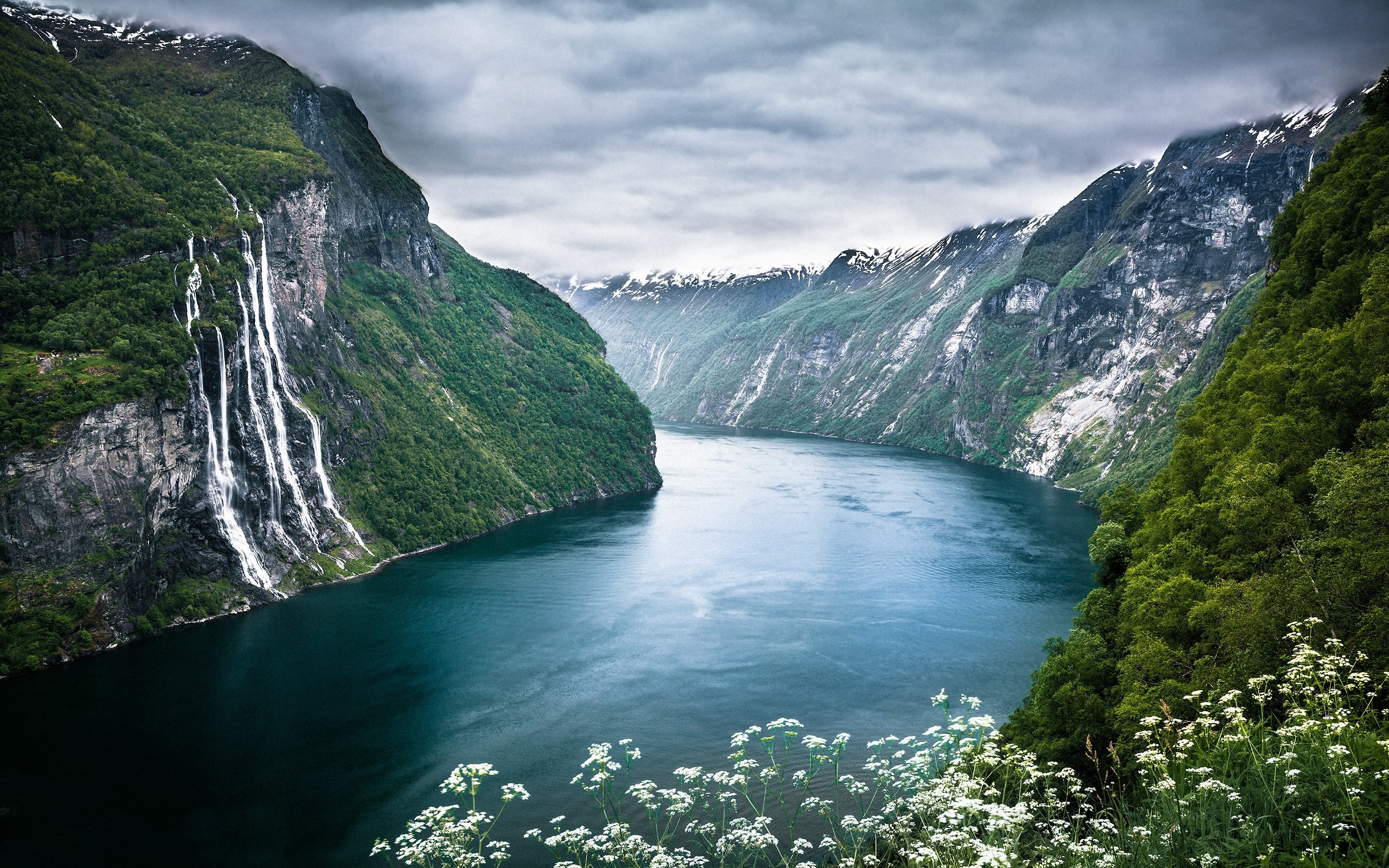 geiranger norway fjord waterfall cliff clouds wildflowers foliage sea nature landscape wallpaper