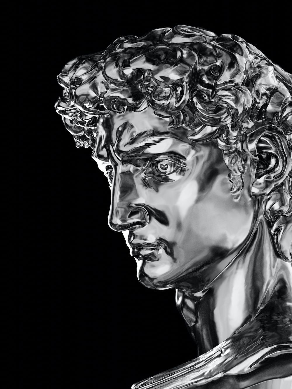 A sculpture of a person with a large head of hair photo