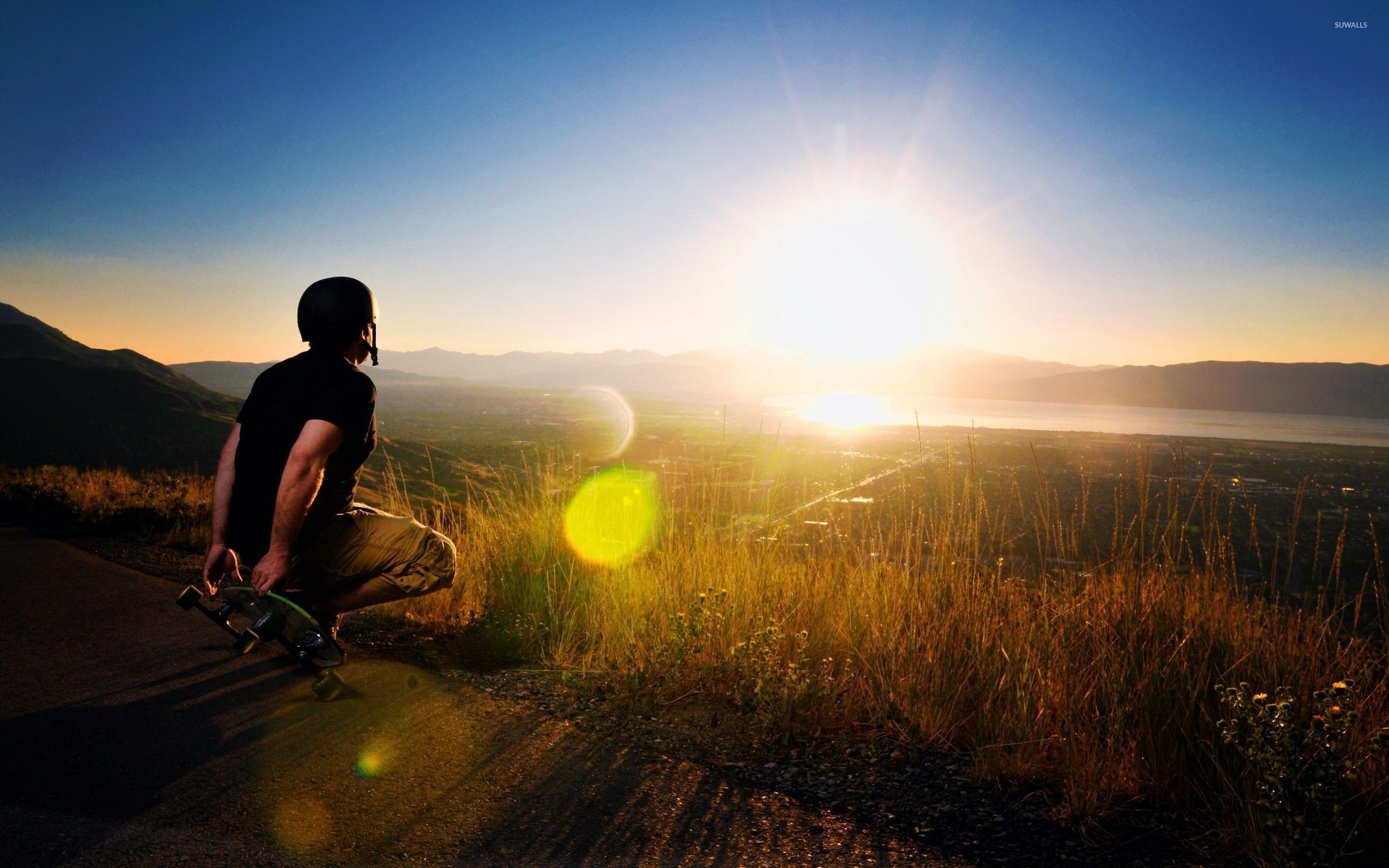 Skater watching the sunset wallpaper wallpaper