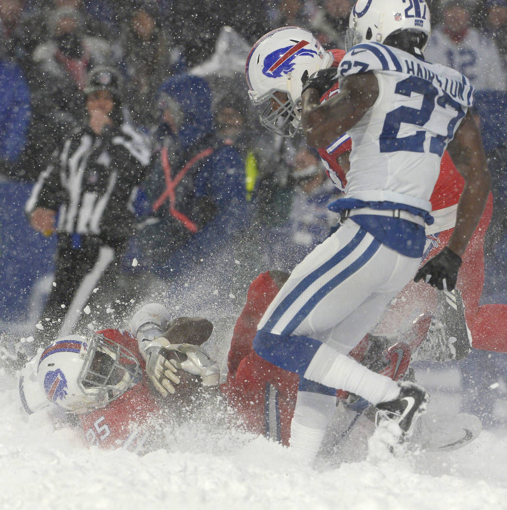 Bills celebrate OT win over Colts with snow angels in endzone
