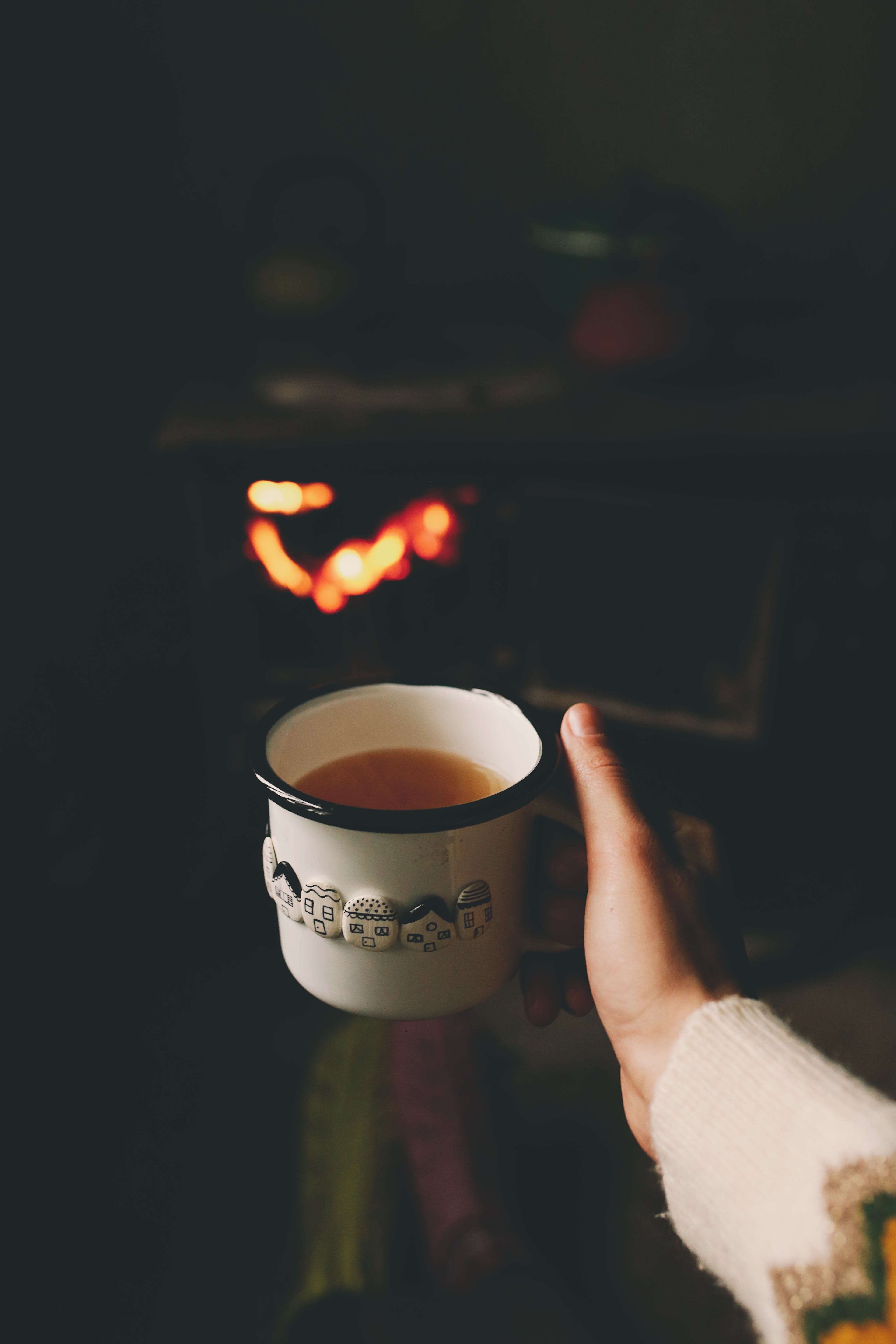 Hand Holding Tea Cup · Free