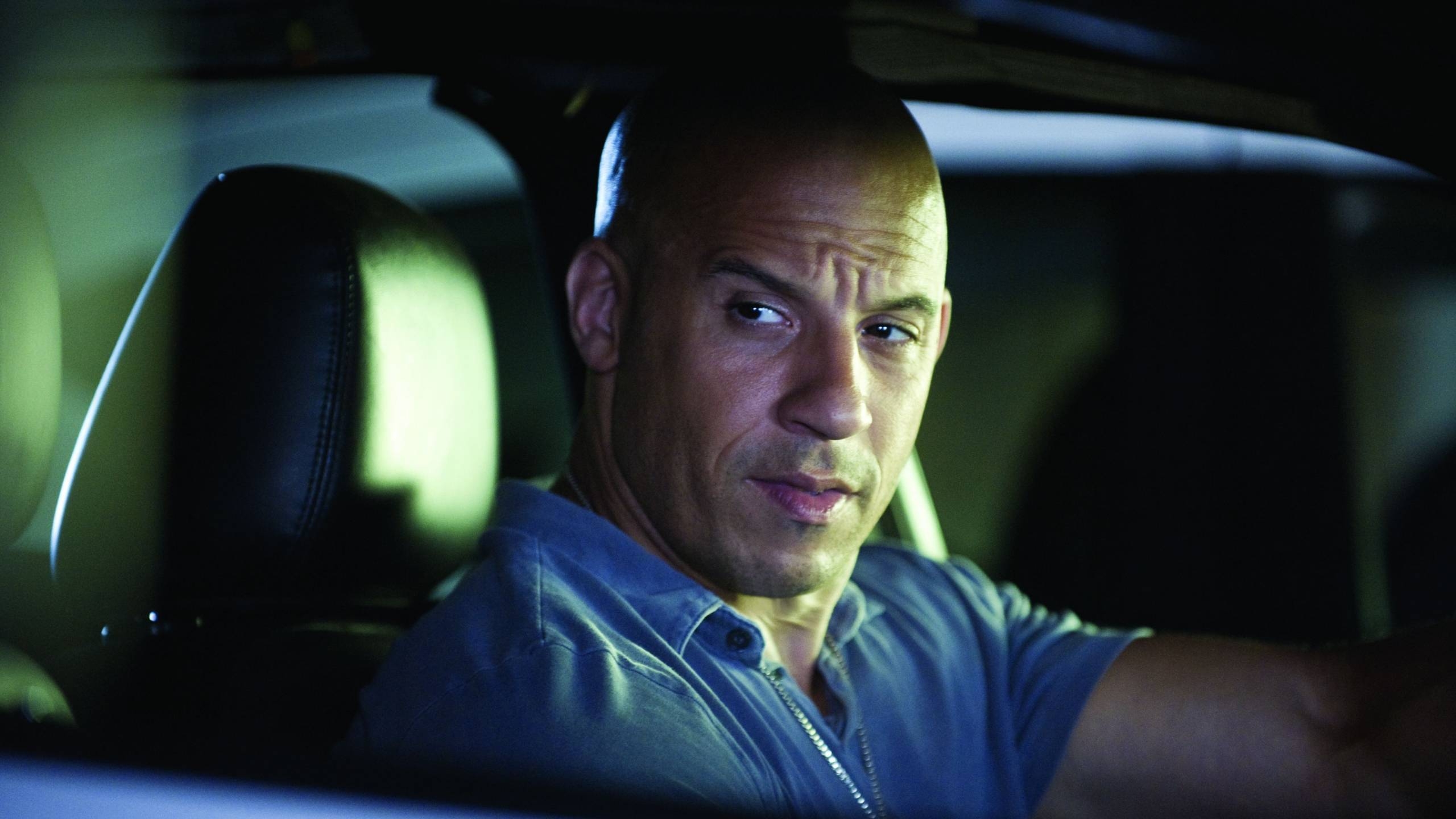 Vin Diesel in Car 2560x1440 HDTV Wallpaper