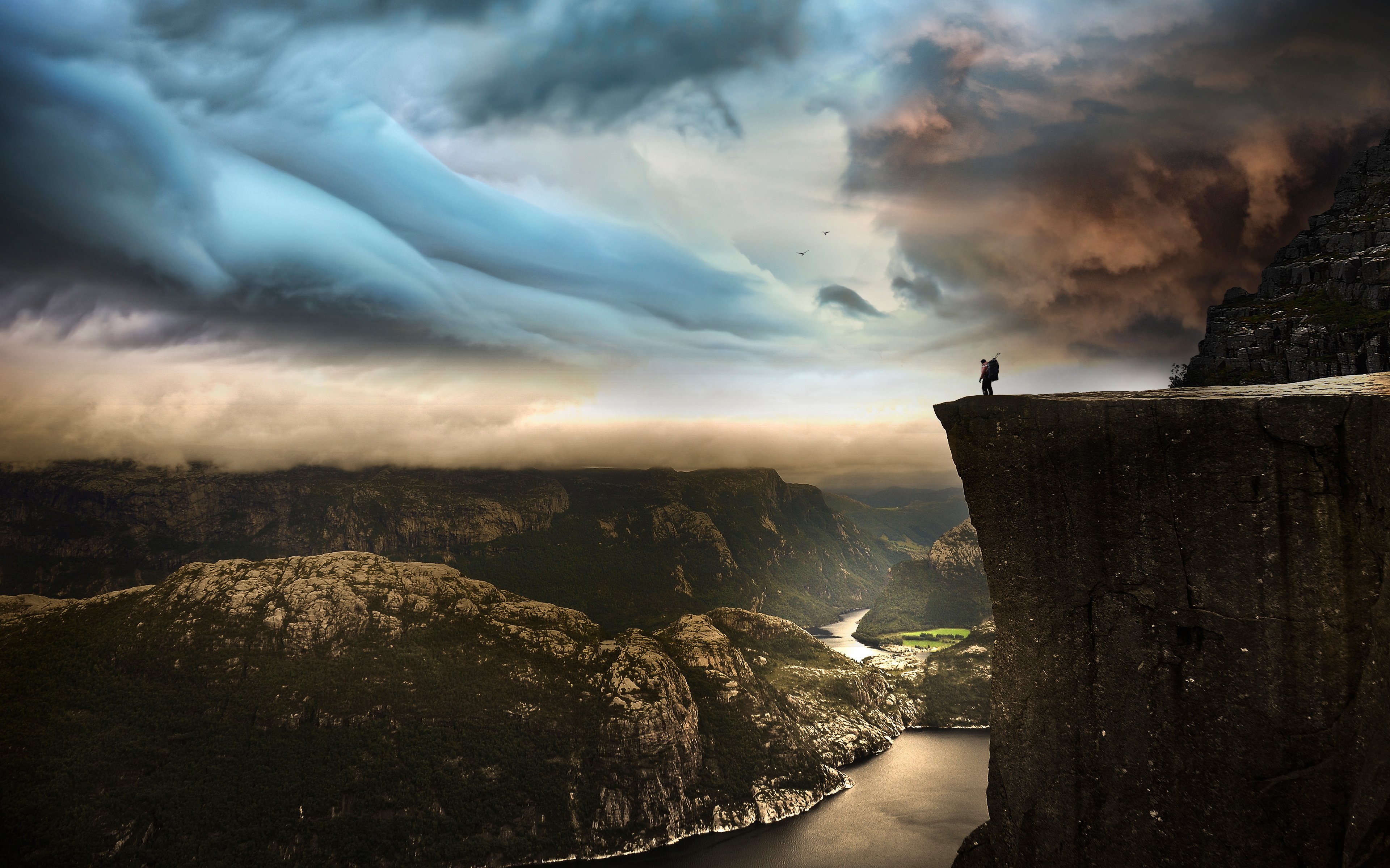 Preikestolen Norway photo by Robin Kamp landscape mountains sky clouds man cliff rock river wallpaperx2400