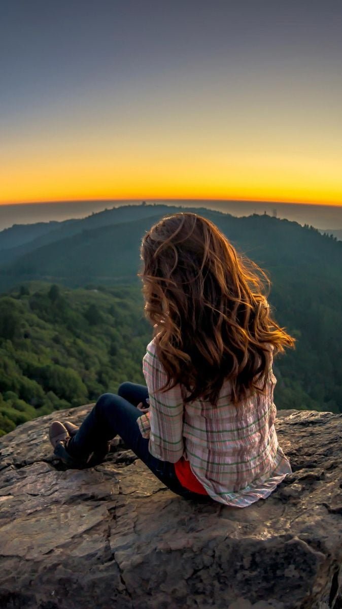 Alone girl at the edge of mountain Wallpaper Download