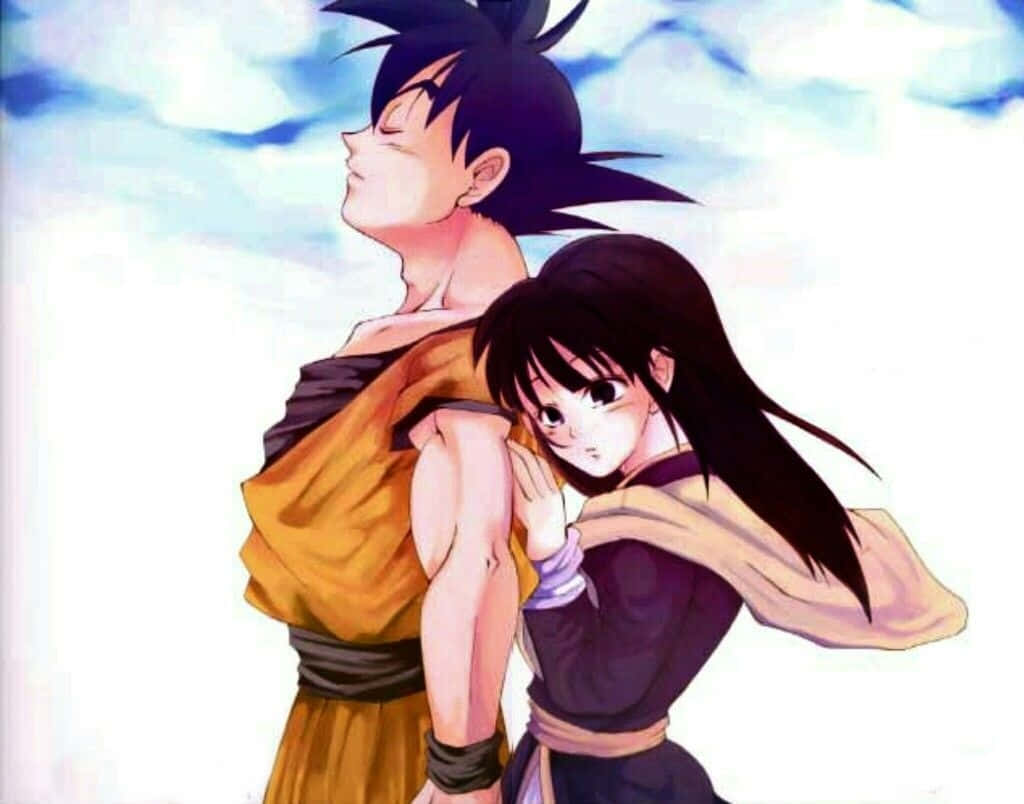 Download Goku and Chichi sharing a heartfelt embrace Wallpaper
