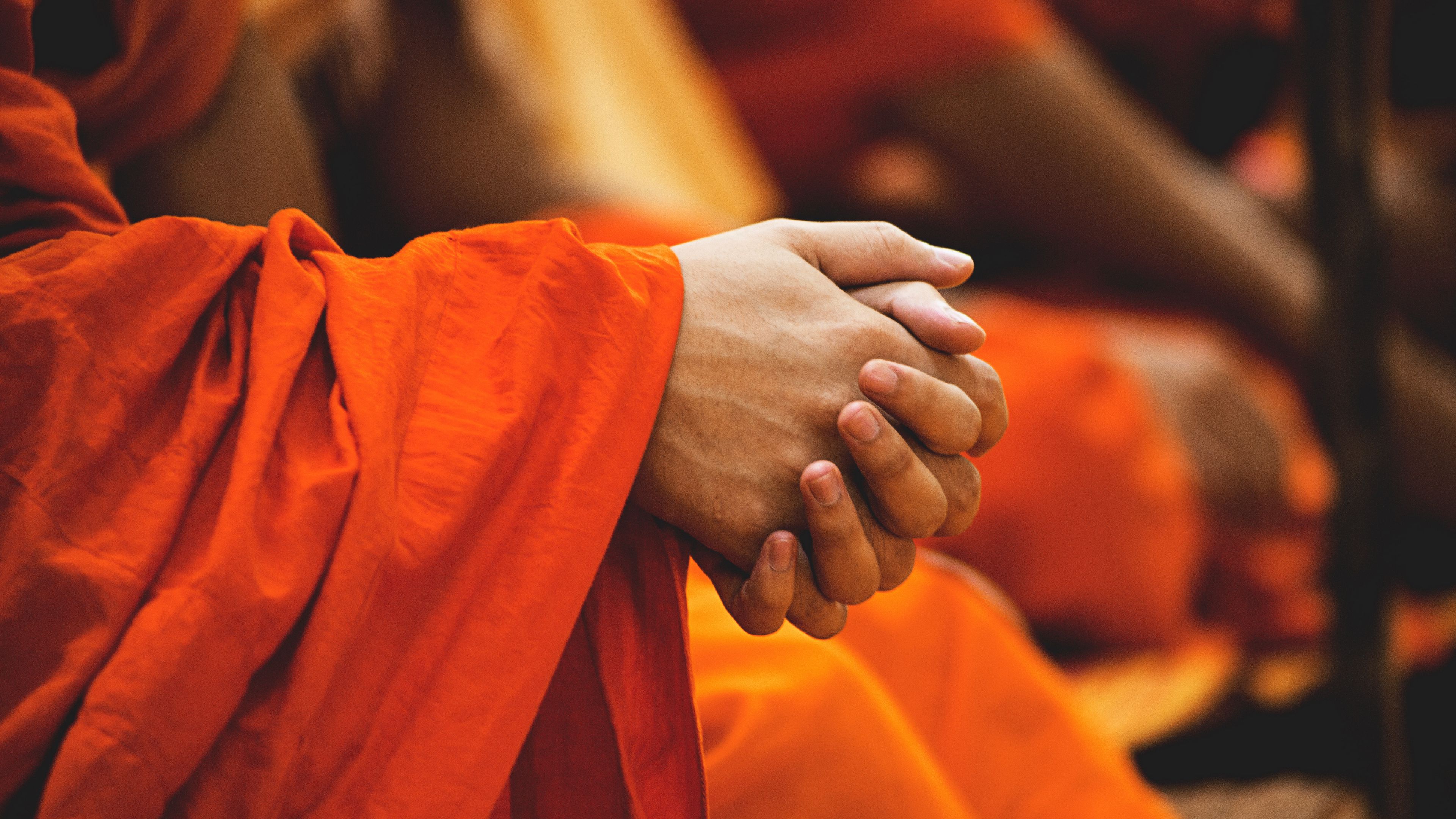 Download wallpaper 3840x2160 hands, monk, buddhist, buddhism 4k uhd 16:9 HD background