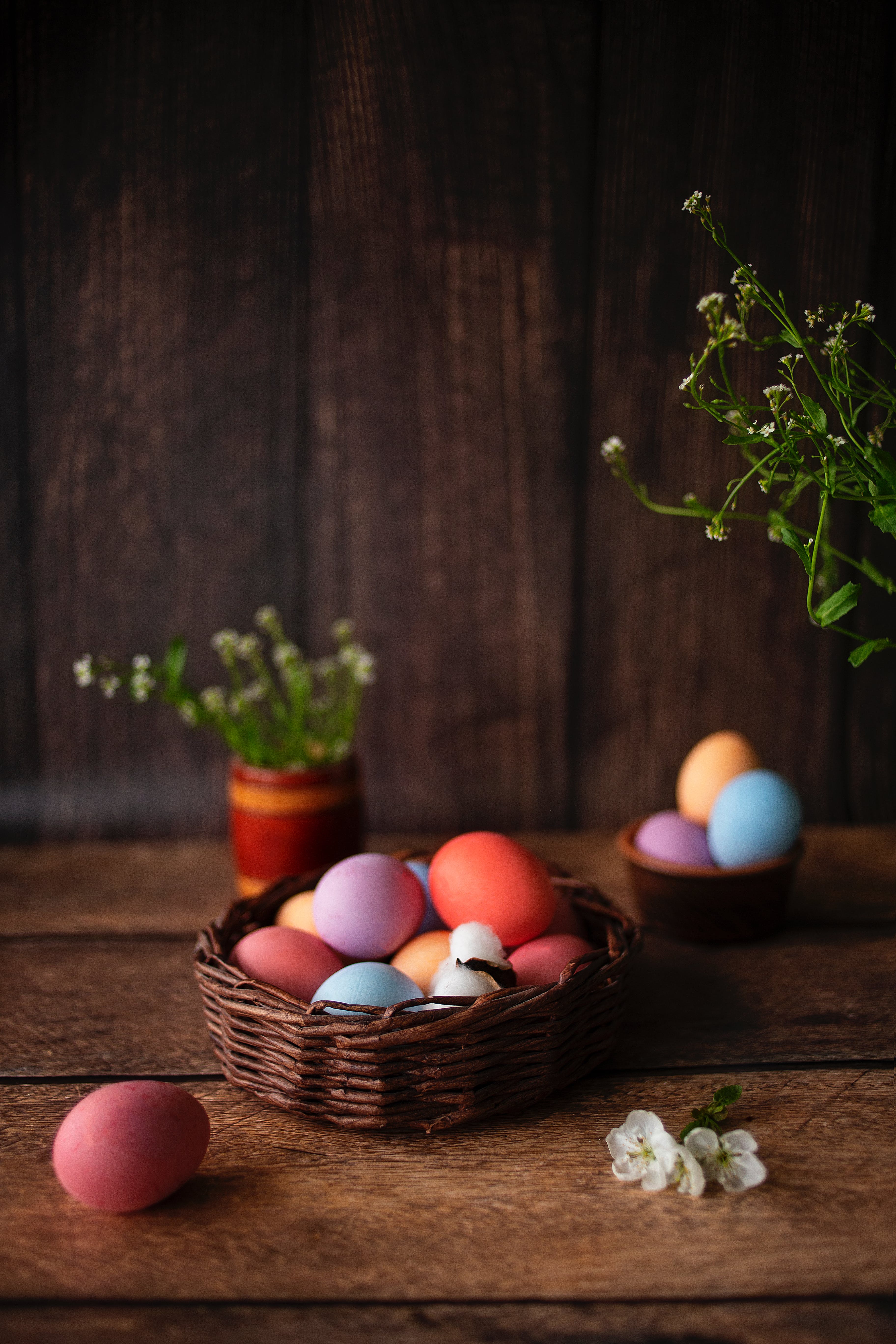 Colourful Easter Eggs in Wicker Basket