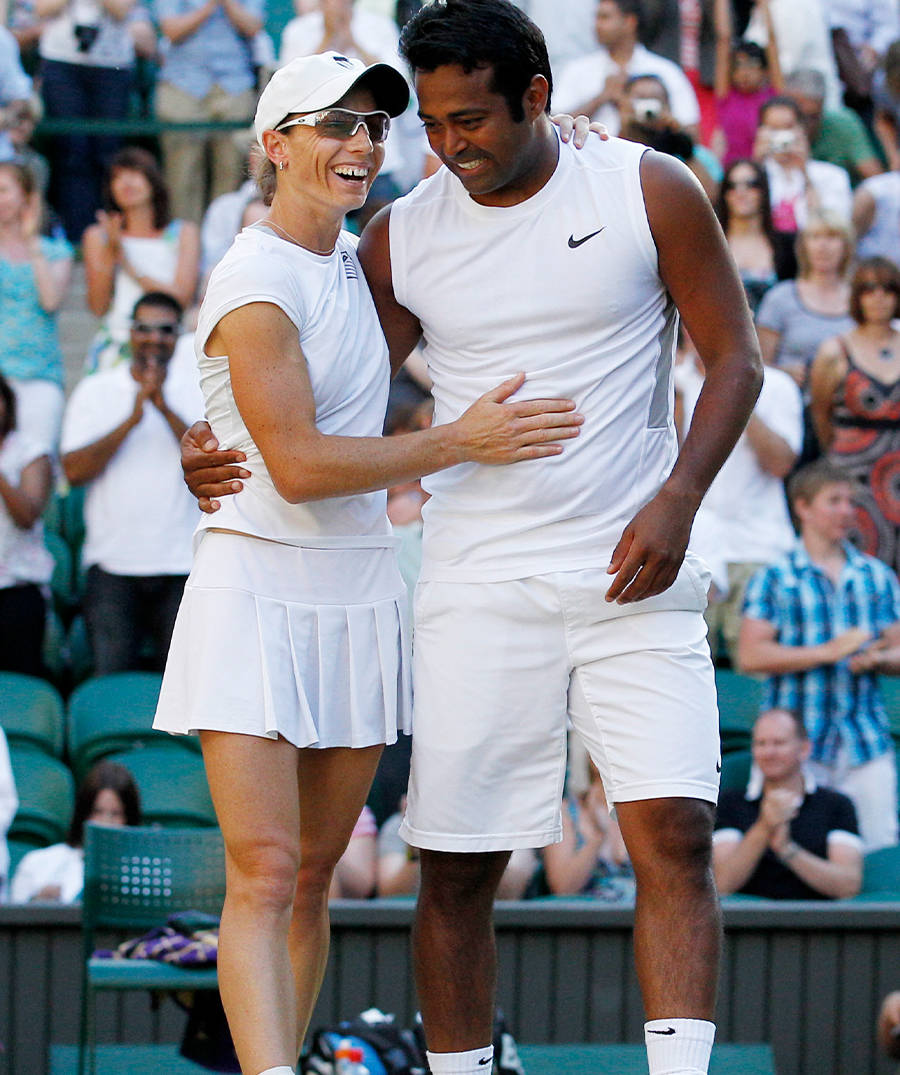 Download Professional Tennis Players Cara Black and Leander Paes in Action Wallpaper