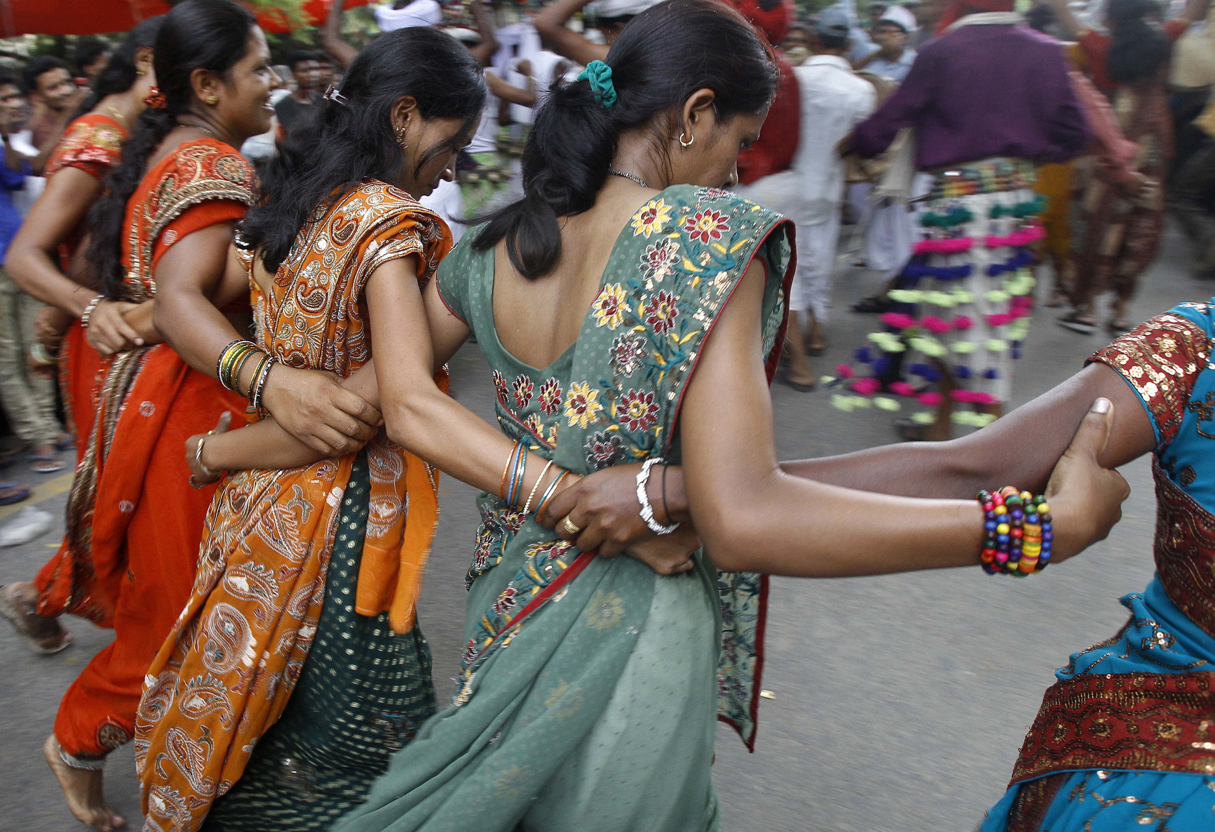 Tribal dancers from the western Indian state of Gujarat perform at a rally to mark International Day of the World's Indigenous People, in New Delhi, India. The word 'tribal' is a collective