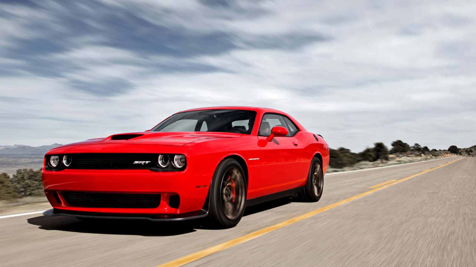 Download Power and Speed Dodge Hellcat in the Spotlight Wallpaper