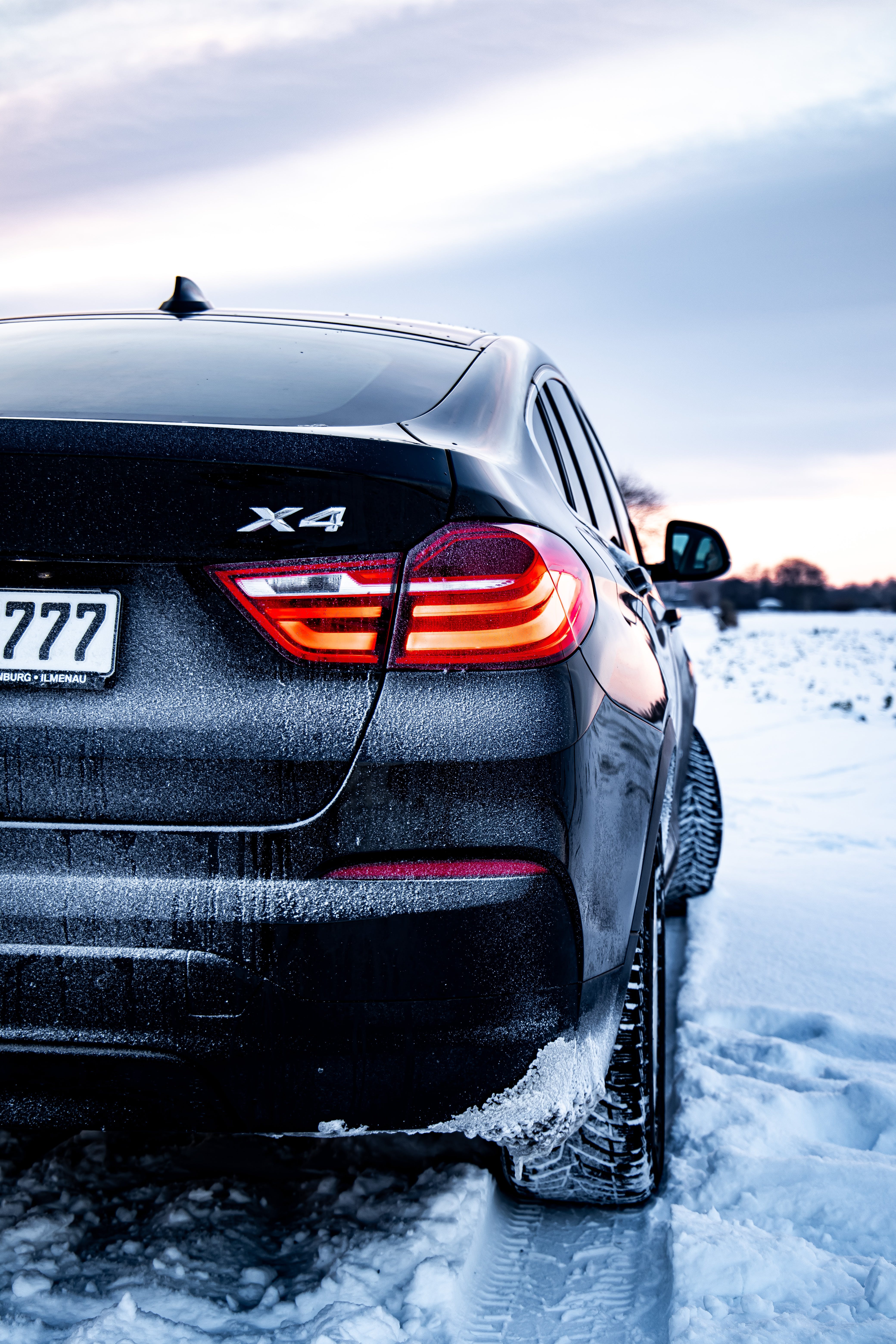 A Black BMW X4 during Winter · Free
