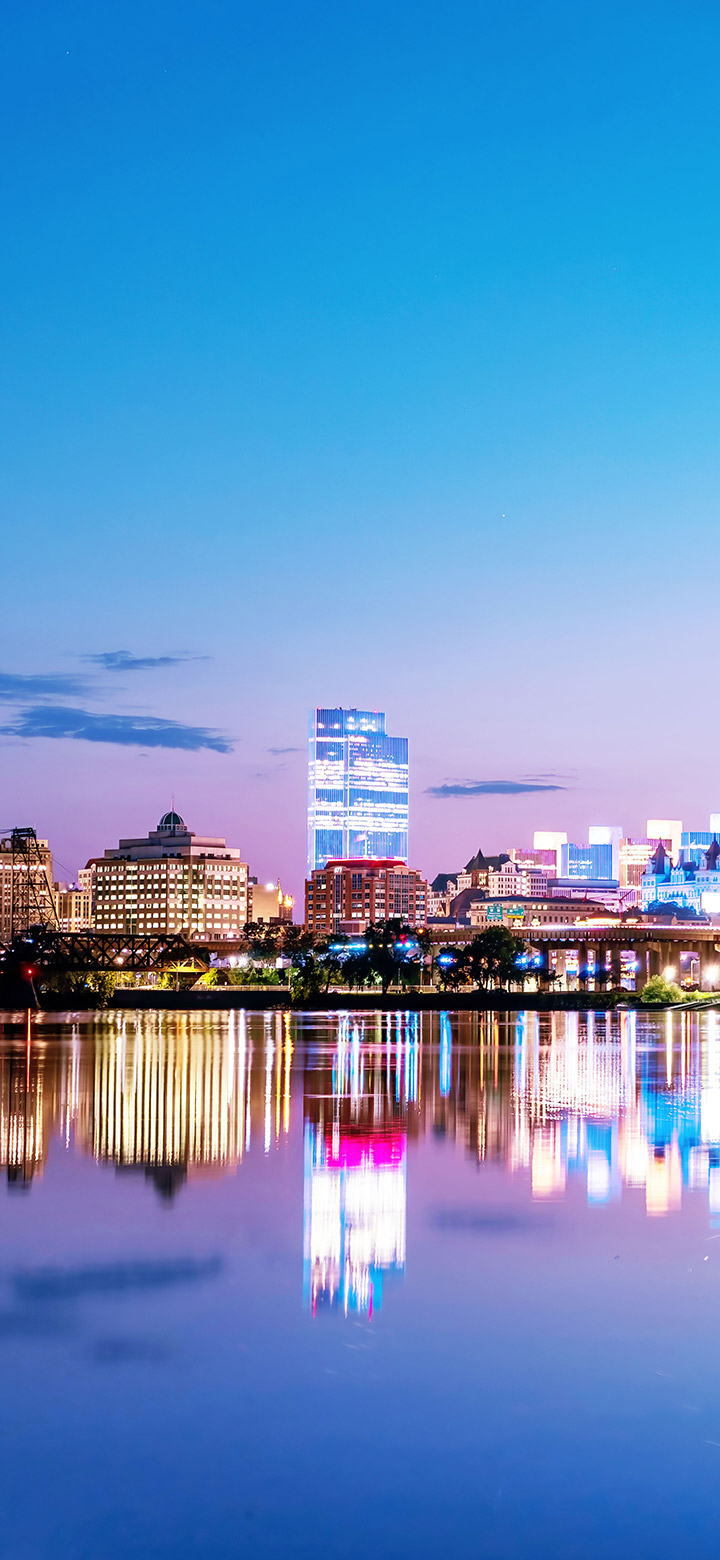 Evening Reflection Of The City On Blue