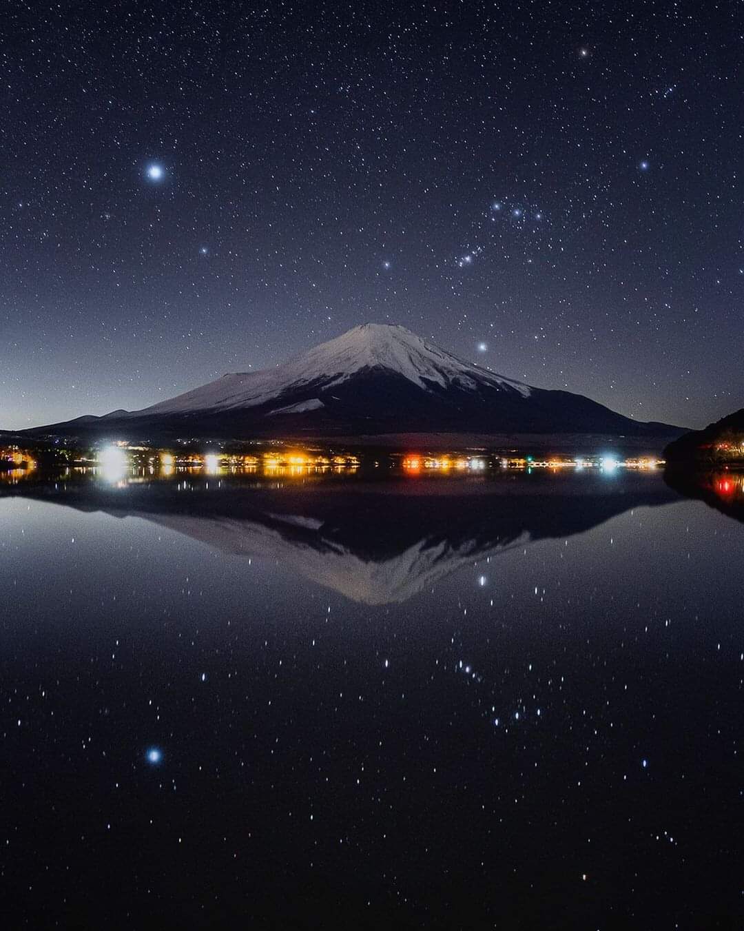 Star Sirius and Orion Constellation over Mt. Fuji